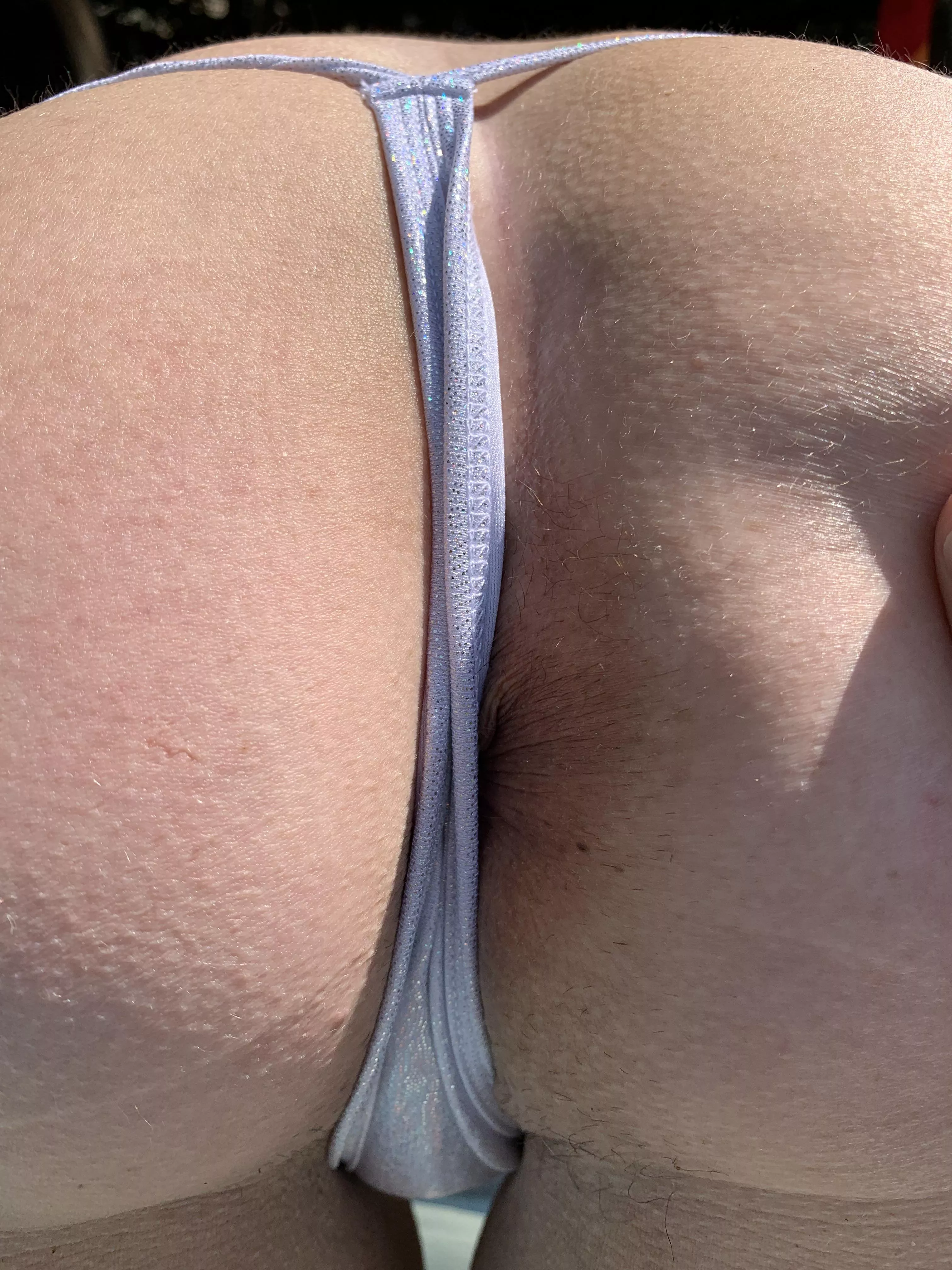 Sneaking a peak of my wife’s cute butthole behind a silver thong Sneaking a peak of my wife’s cute butthole behind a silver thong