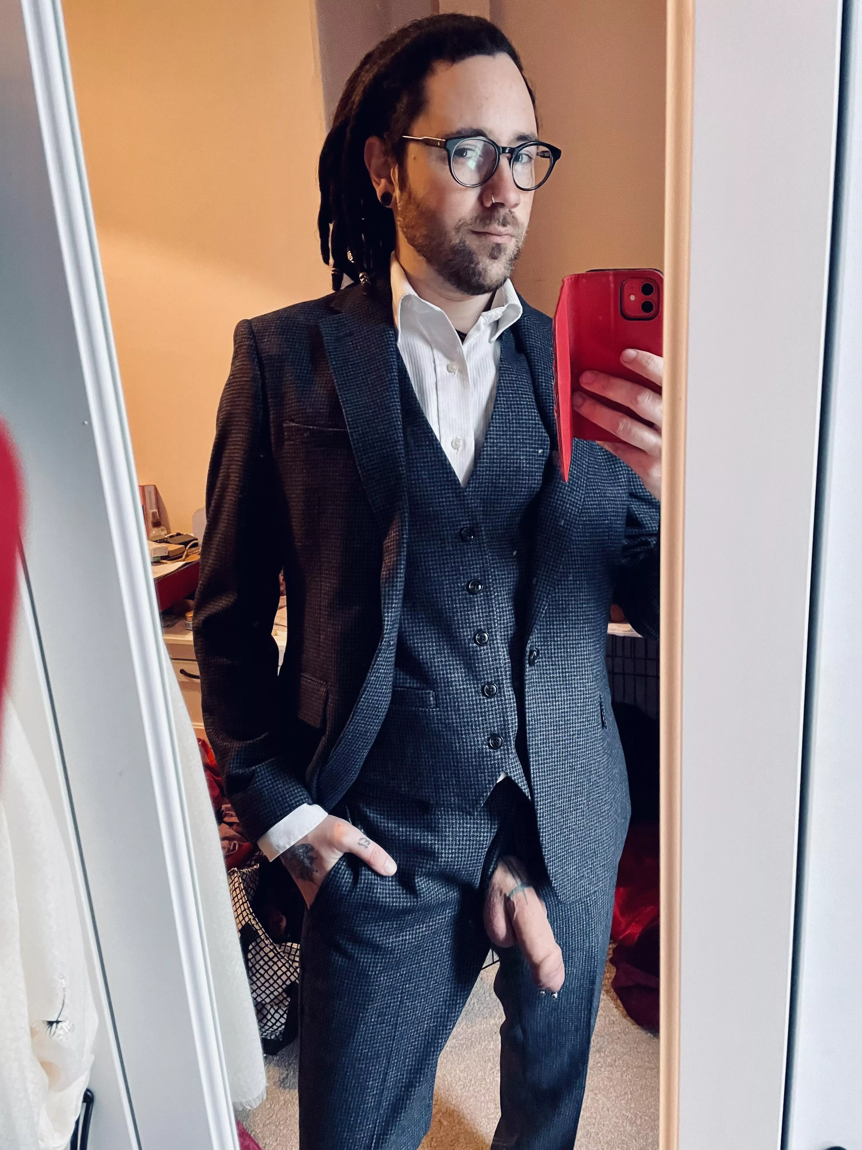 Spot the tats, suit edition