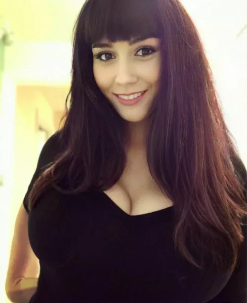 Stunning brunette with some massive tits