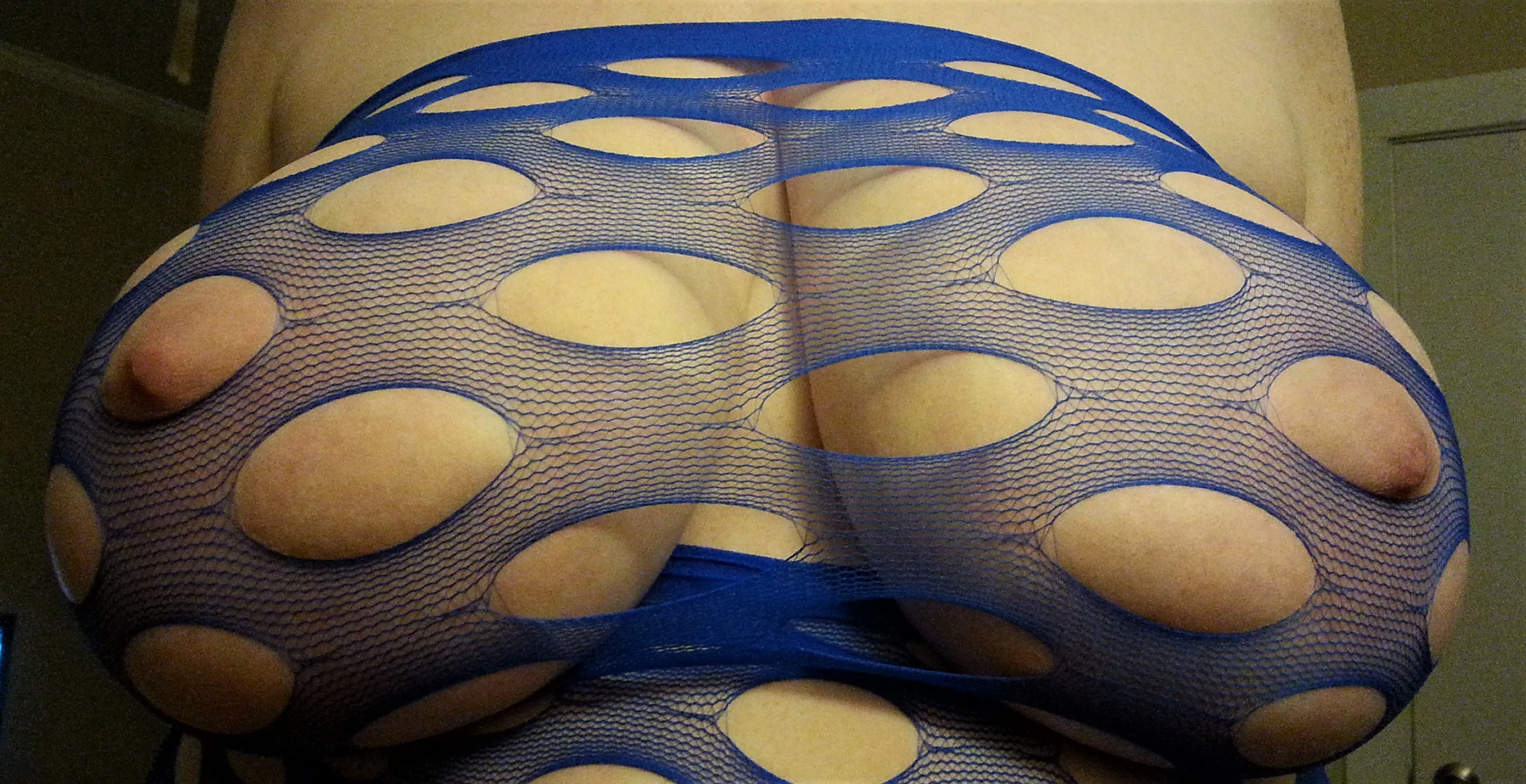 Such massive tits fishnet barely holding together Such massive tits fishnet barely holding together