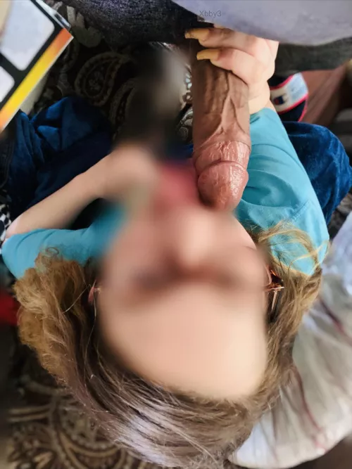 Sucking a fat cock.