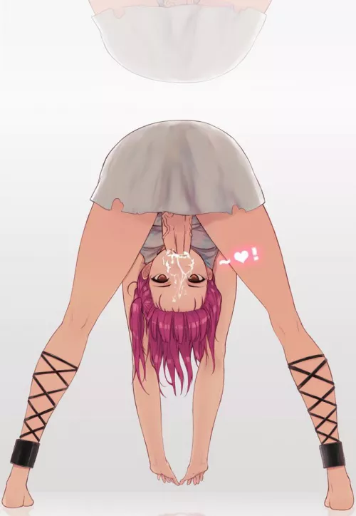 Sucking herself off upside down