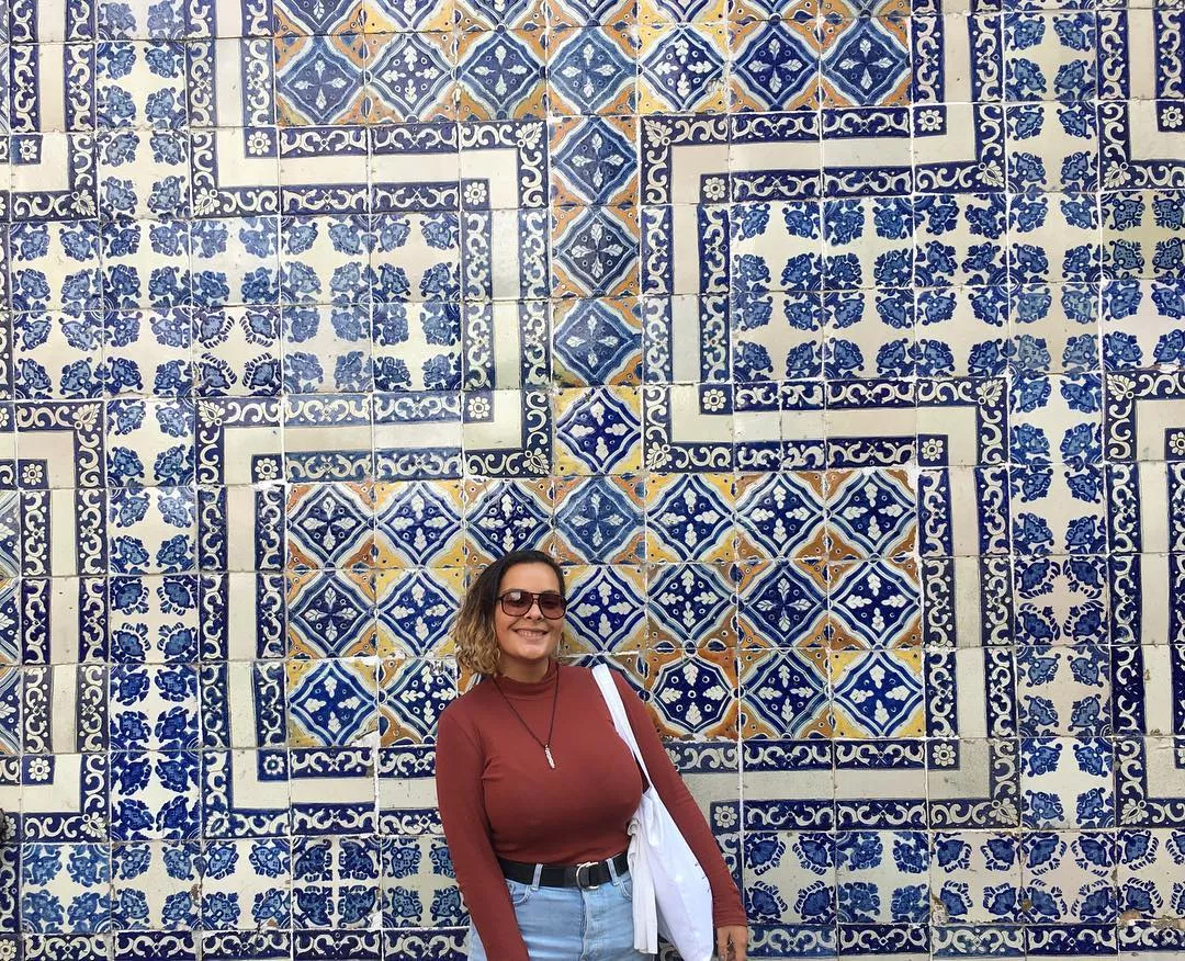 Sweather and bra can't contain her nips