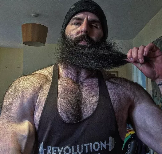 The beard and chest hair are seemingly one.