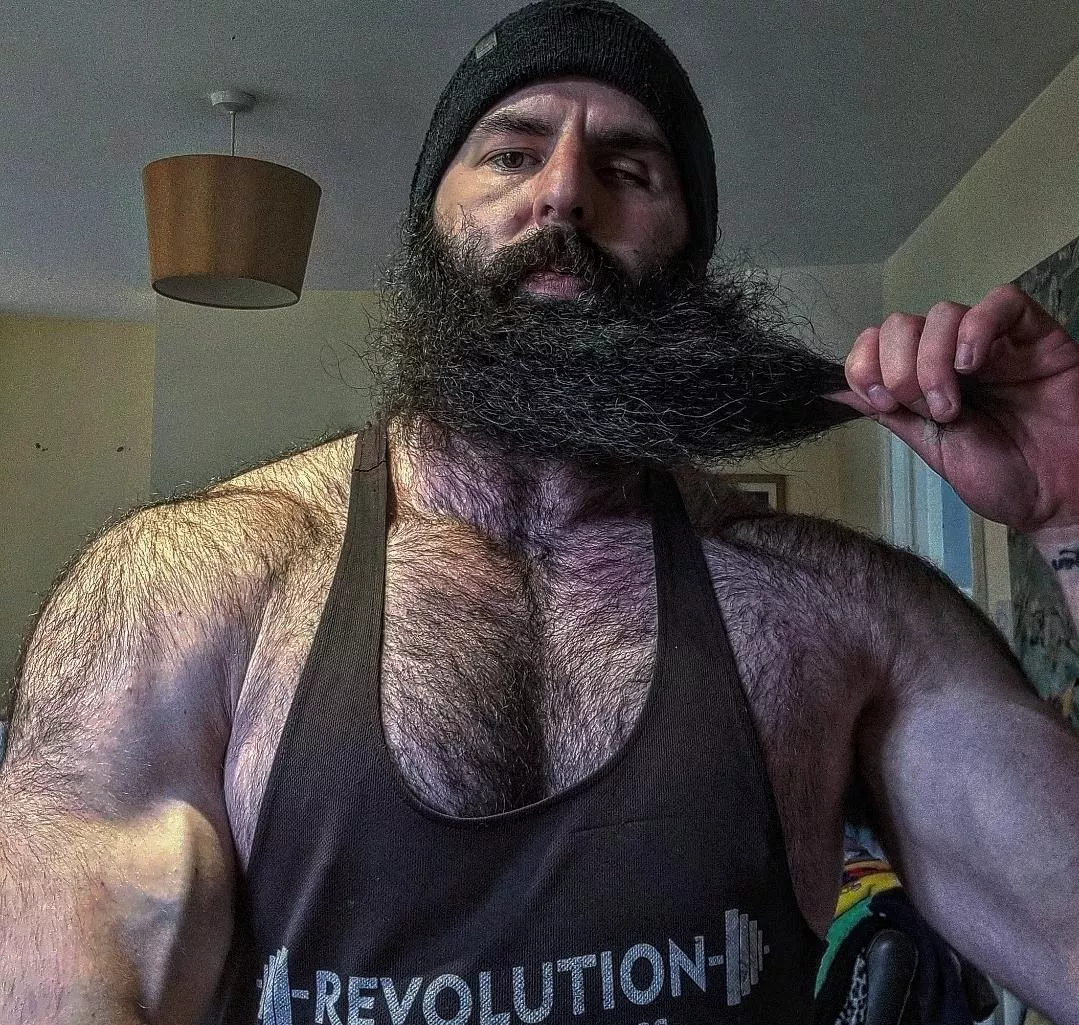 The beard and chest hair are seemingly one.