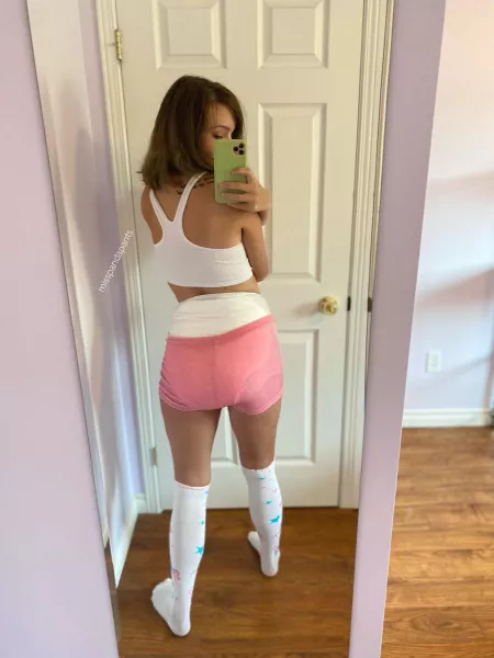 The color pink and white diapers just go together.