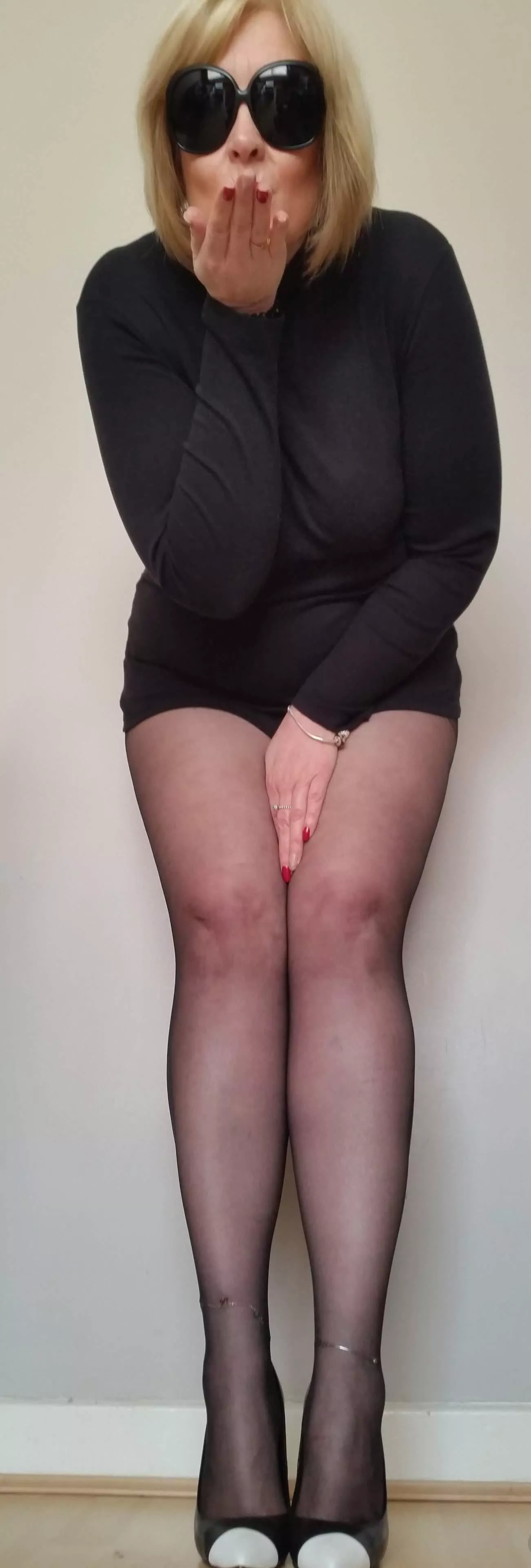 The old rat bag,pig,witch is blowing you a kiss