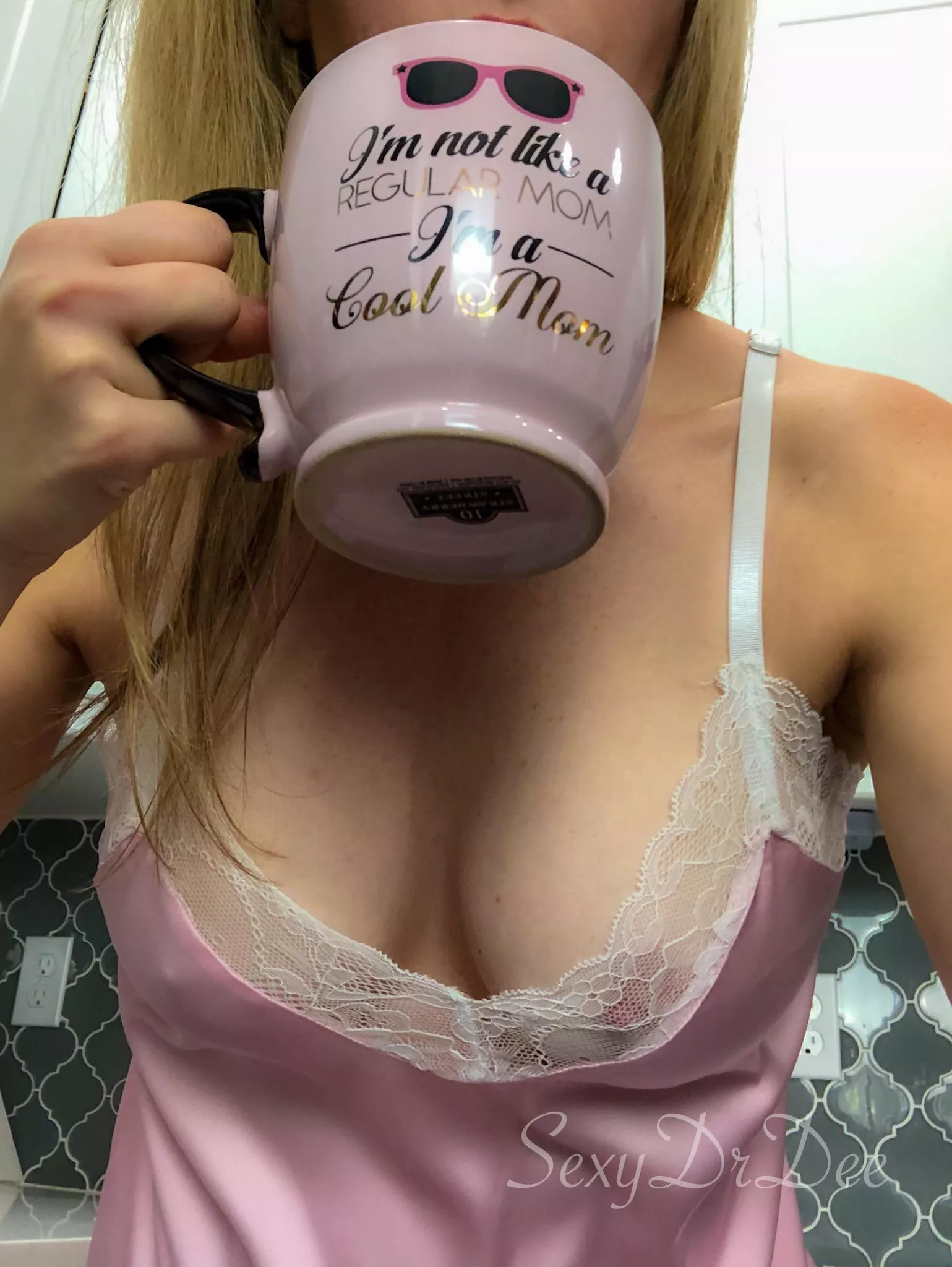 The wife drinking her morning coffee