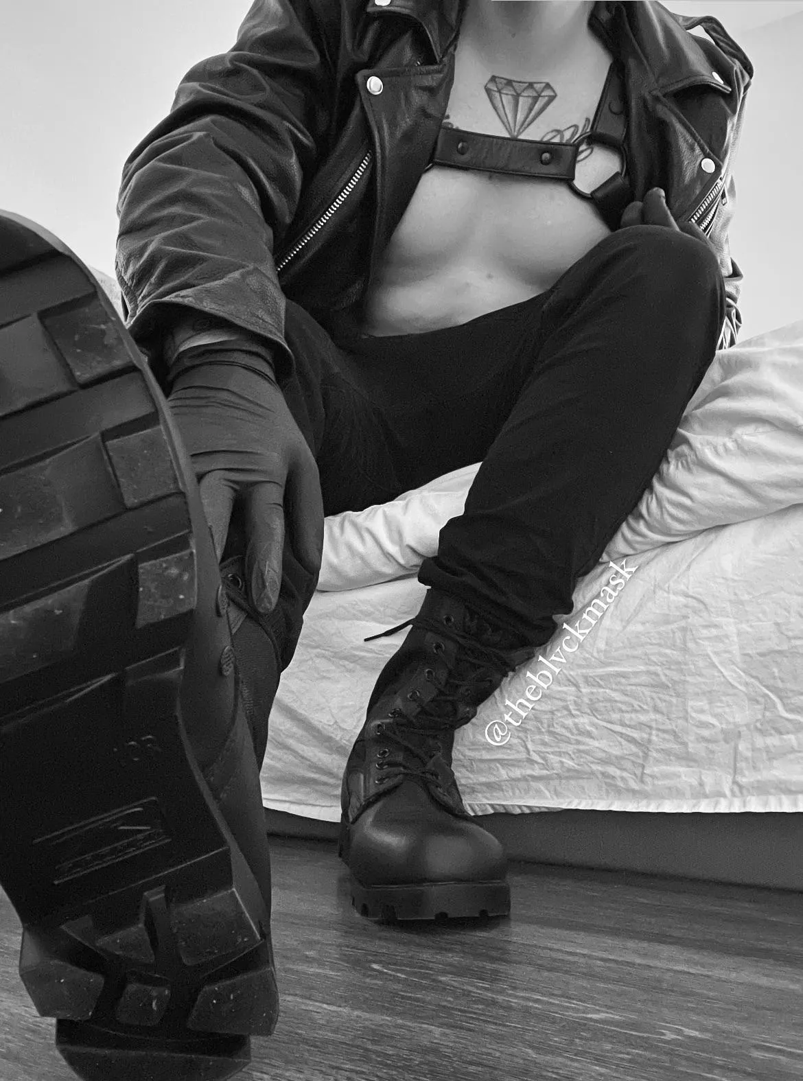 There are tattoos under all this leather