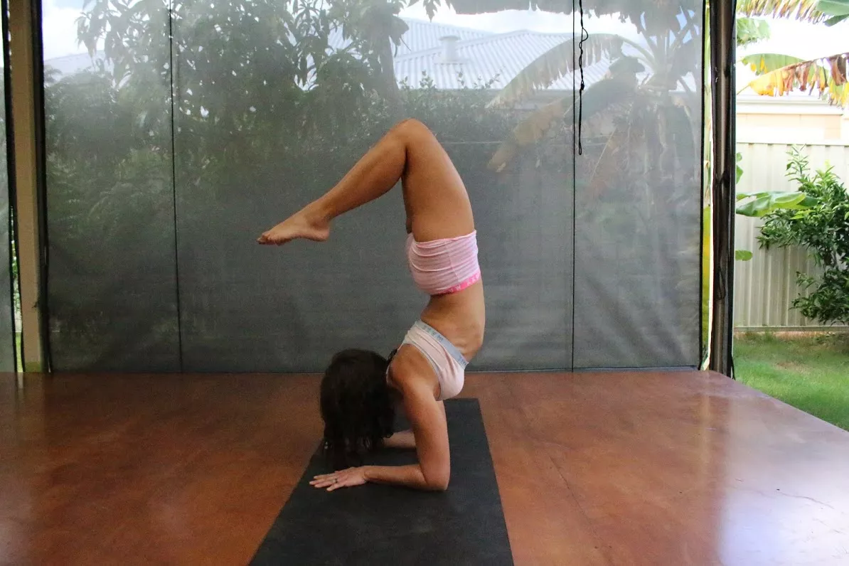 This is my attempt to a scorpion pose... Need to improve my back flexibility...