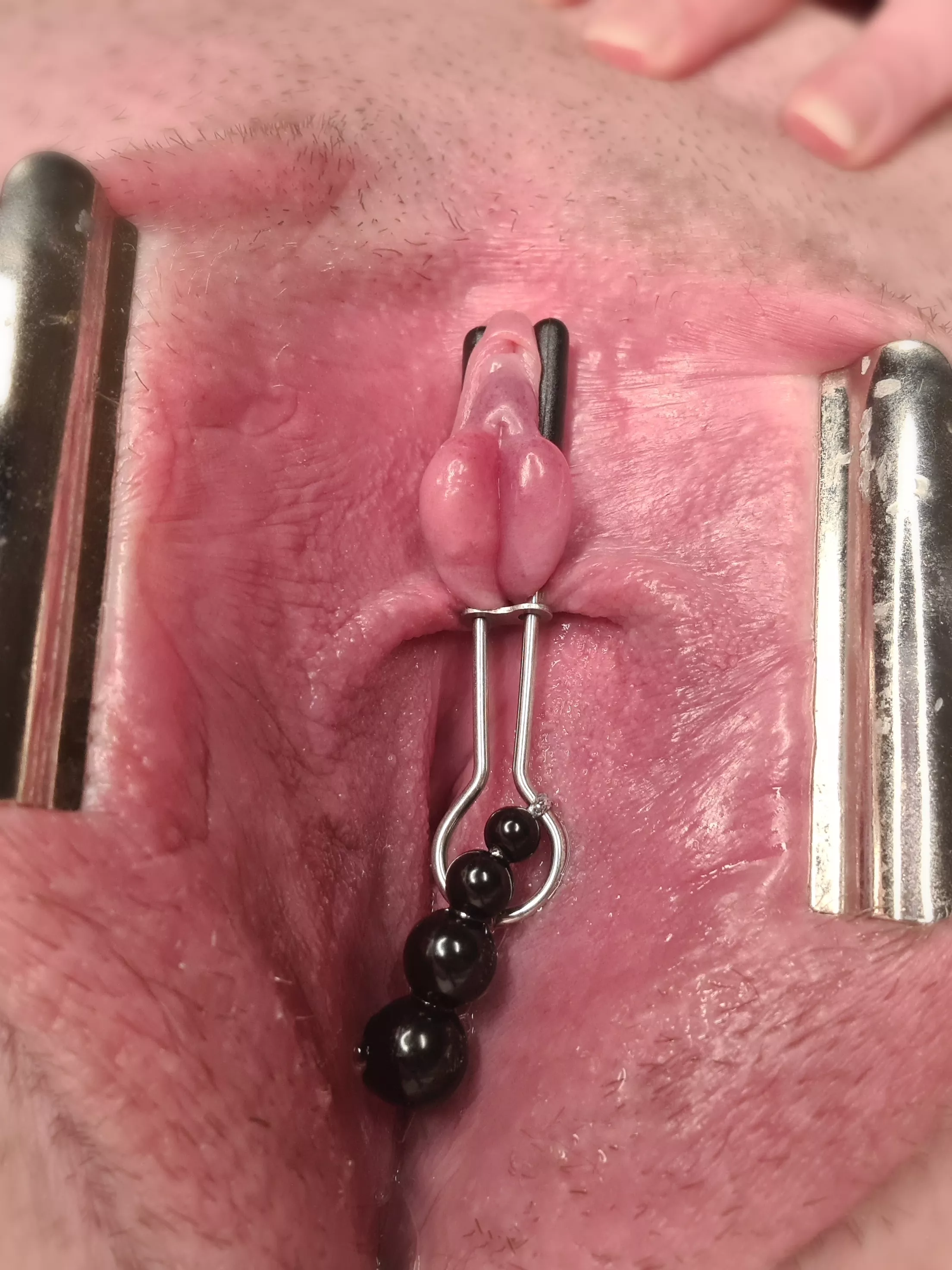 Tiny clit clamped and ready for torture