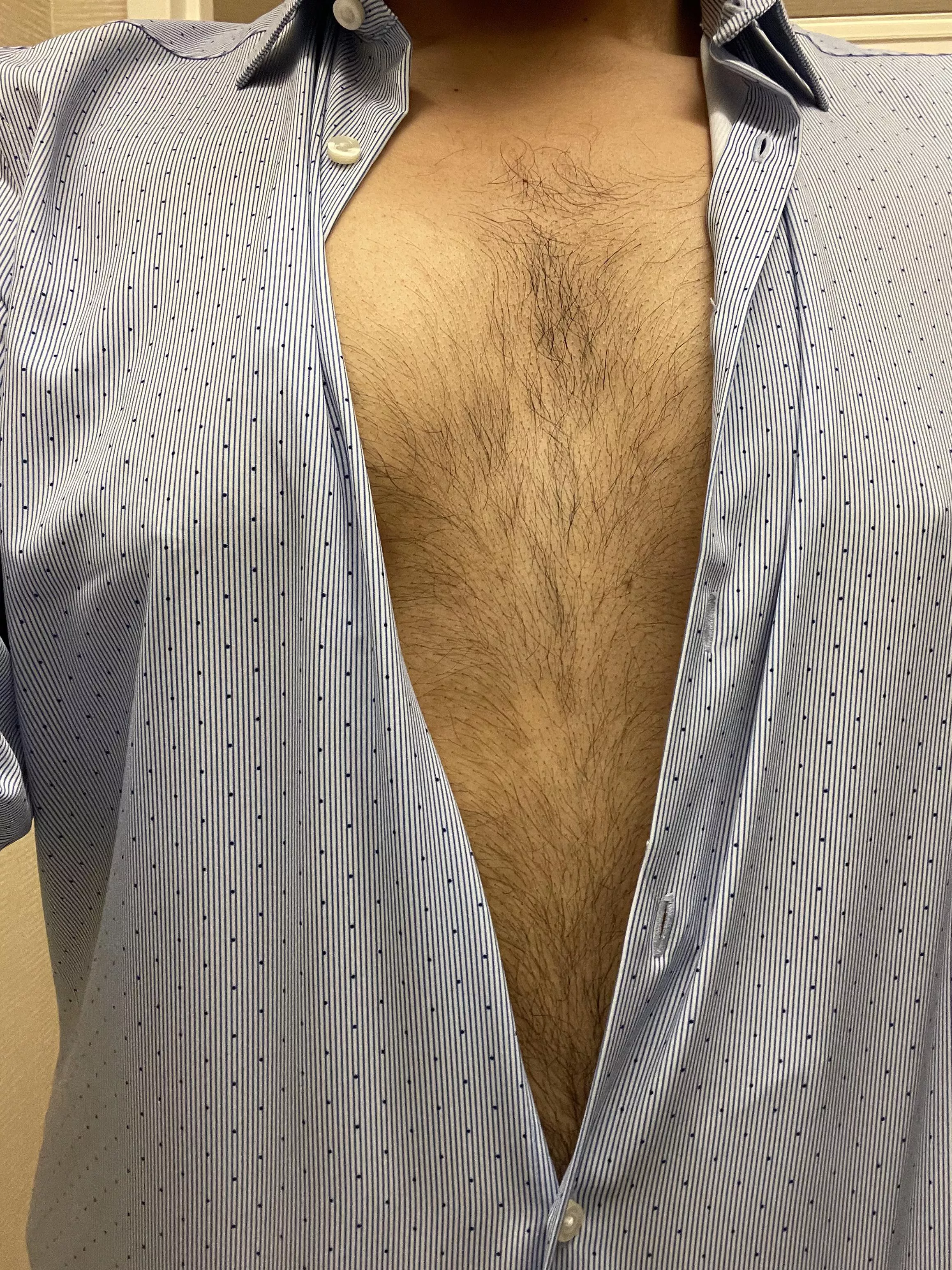 Trying on new shirts