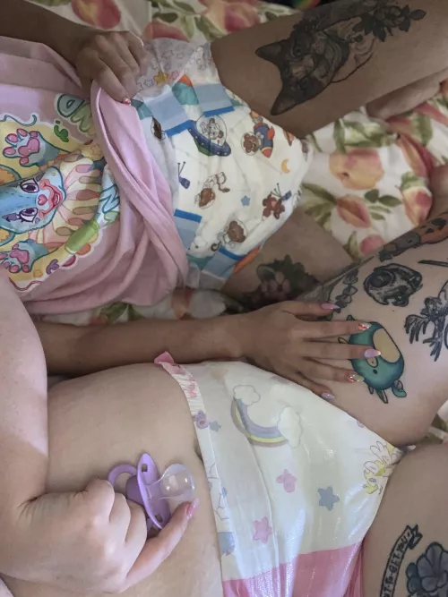 Two little angels all diapered up