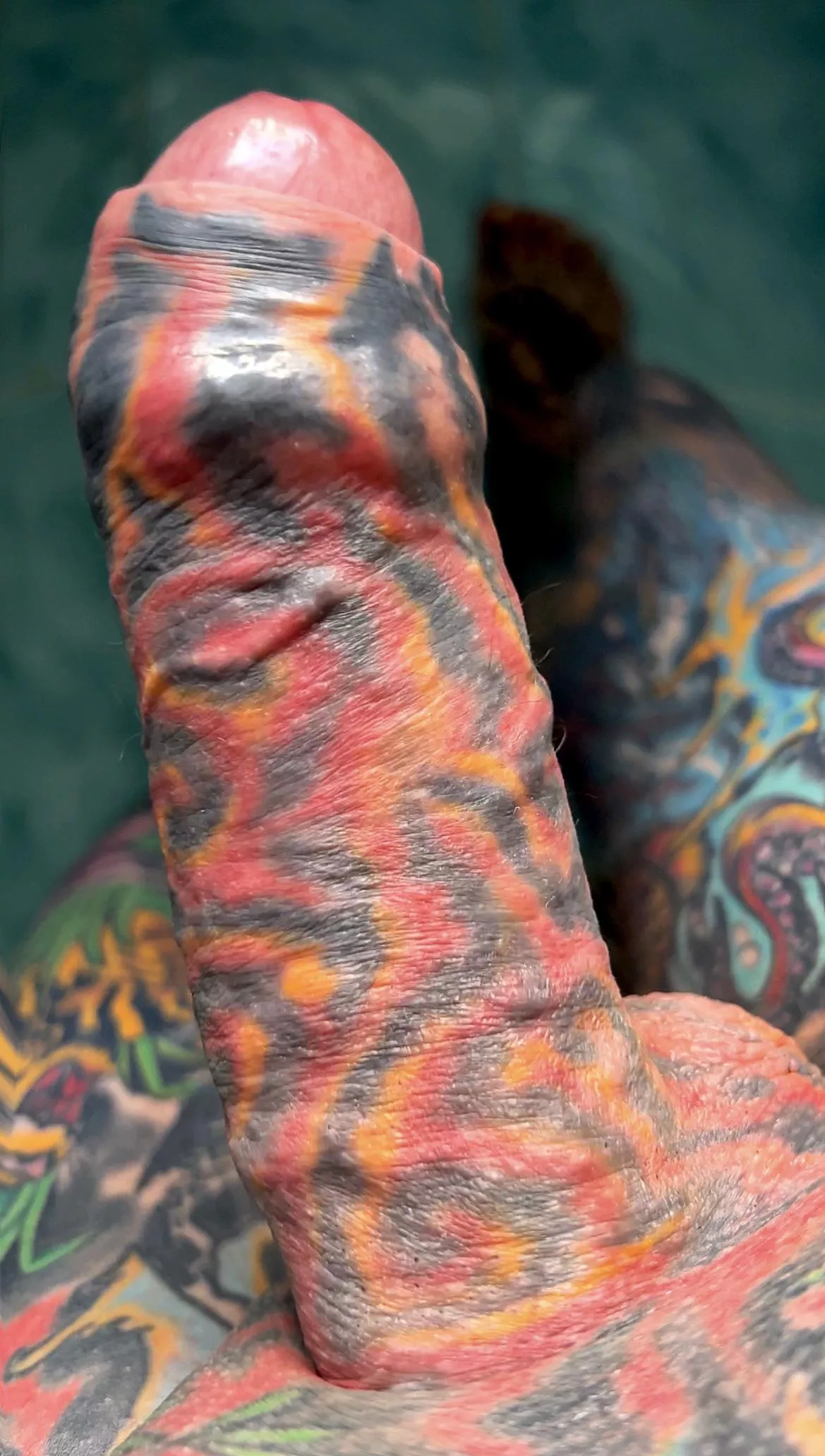 Uncut and tattooed