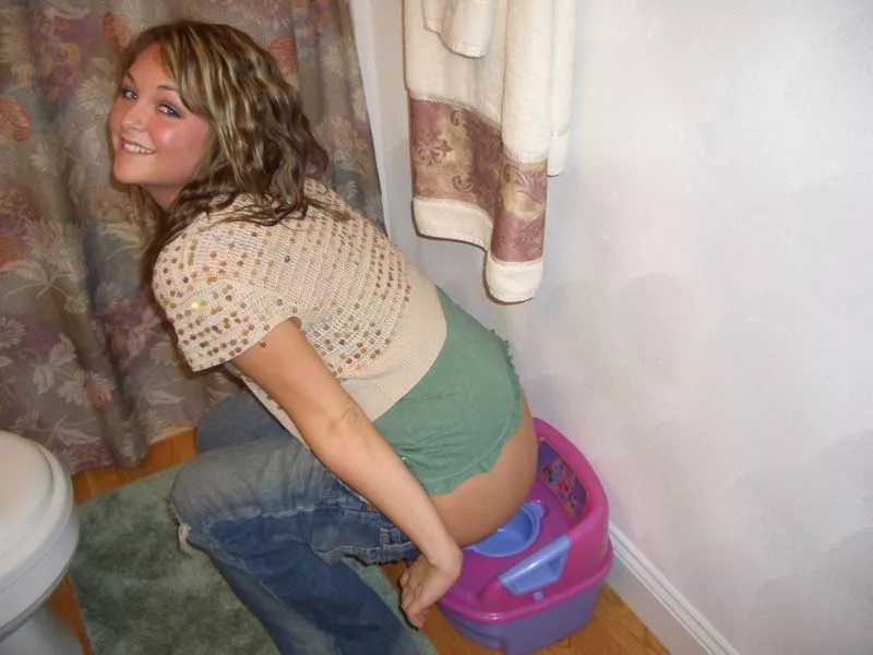 Using a child's potty Using a child's potty