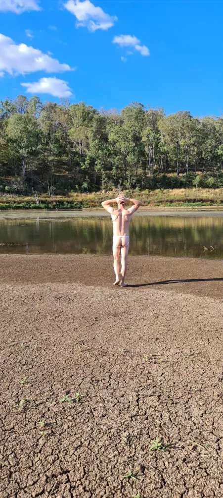Walking outdoors in my jock strap