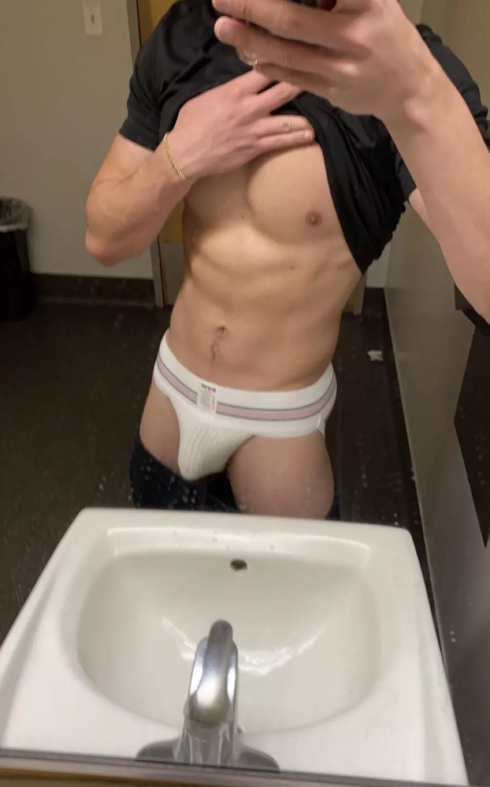 Wearing a jock to the gym for easy access after