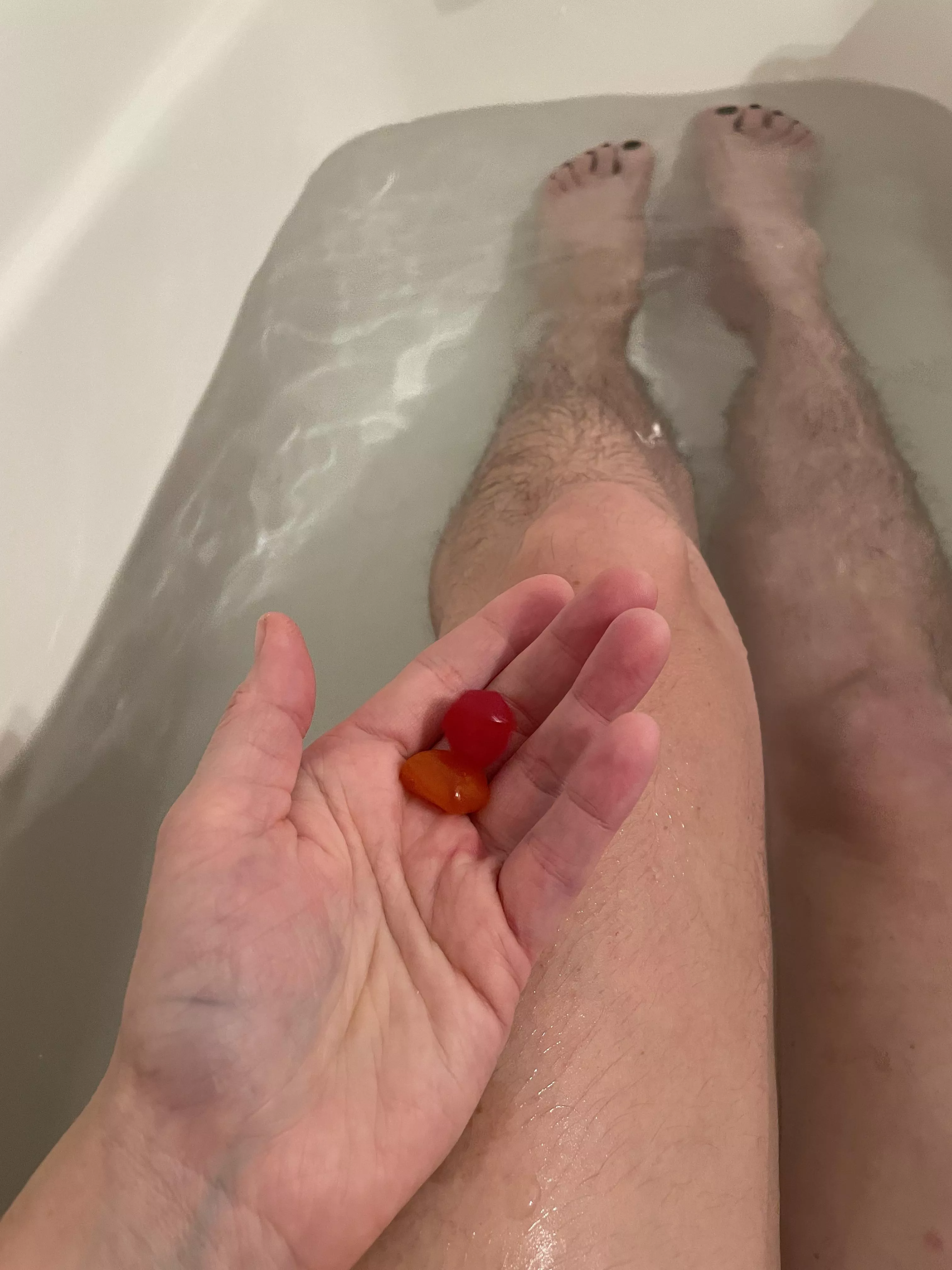 What my self care looks like today: soaking in a bath and fruit snacks.