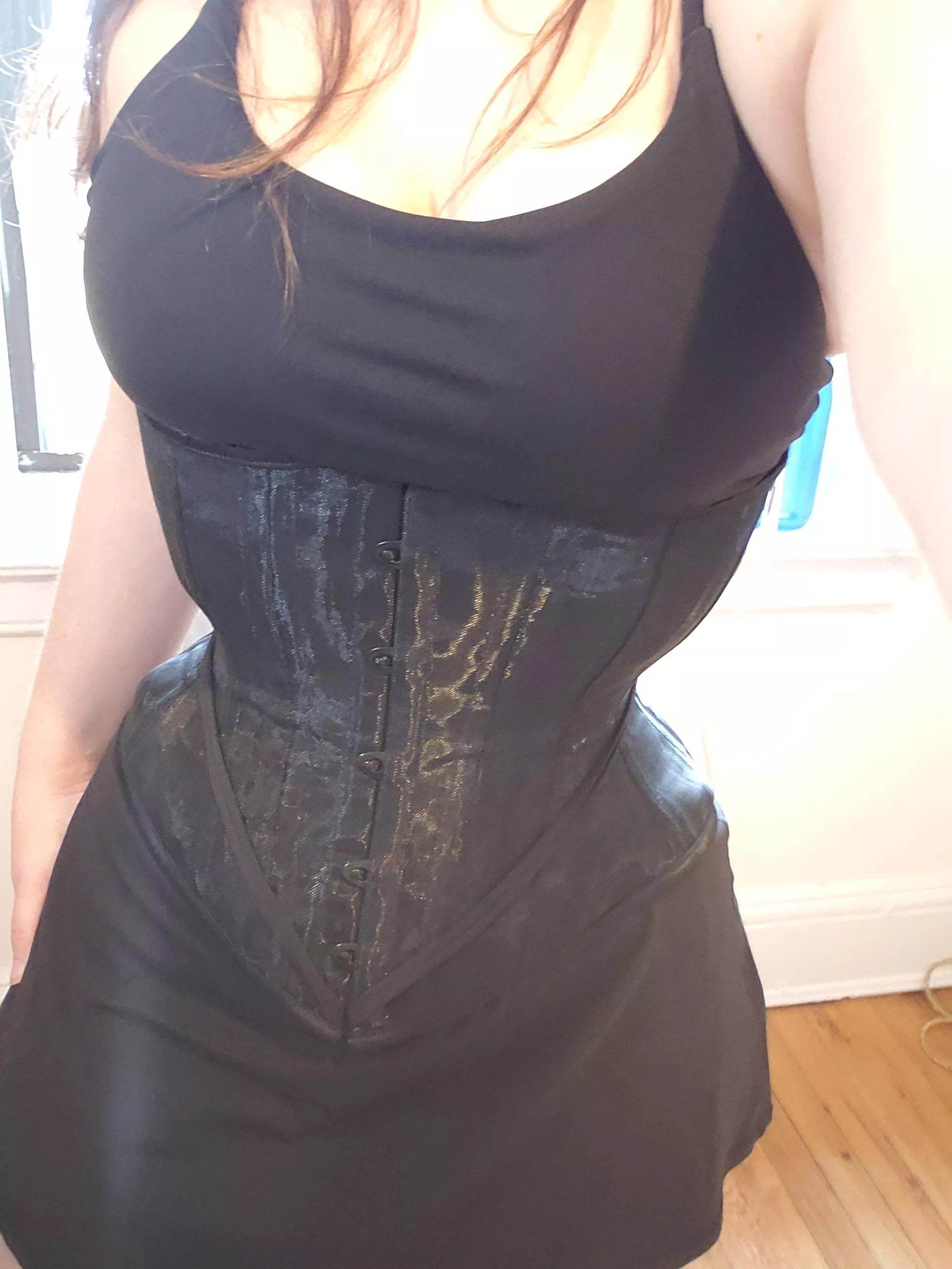 Which do you like more, my corset or my dress?