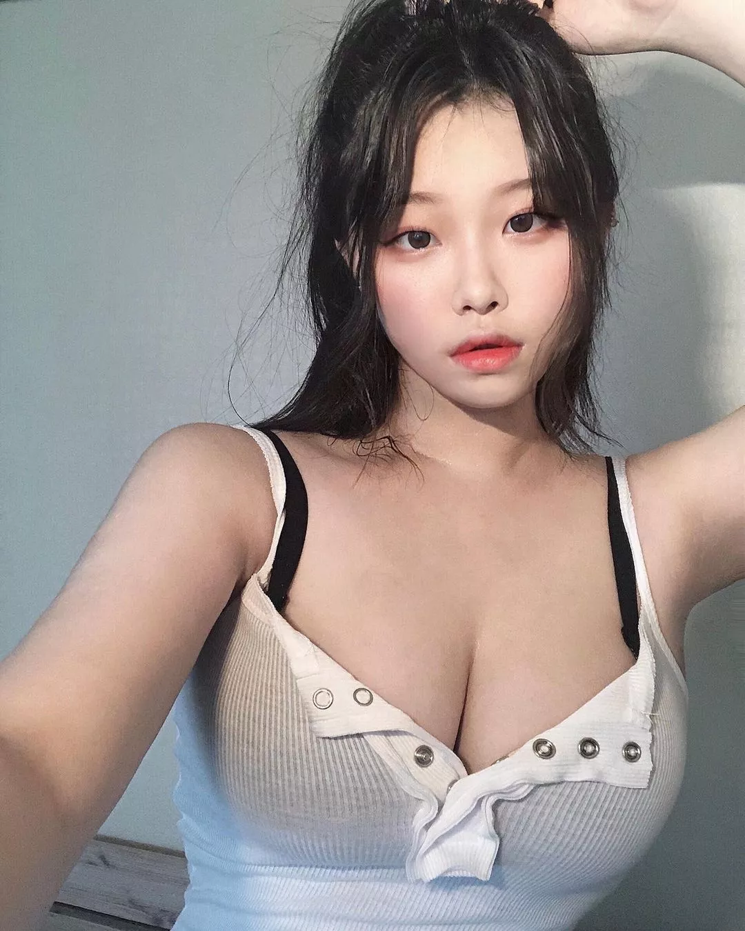 White vest and cleavage