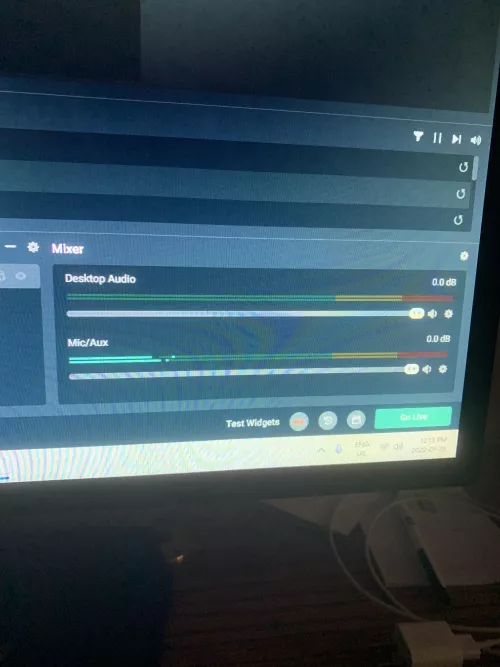 Why does my mic make buzzing noises even when muted? It also does this in game!