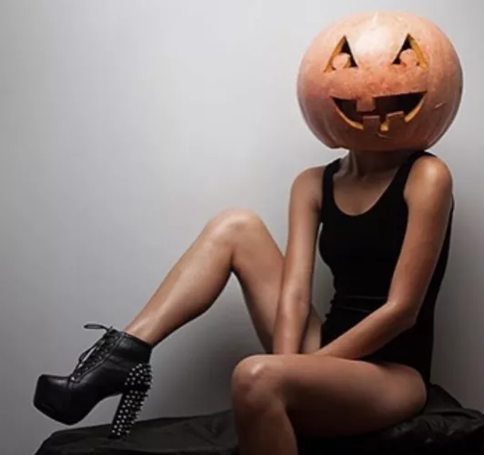 With legs like that, she can keep the pumpkin head on