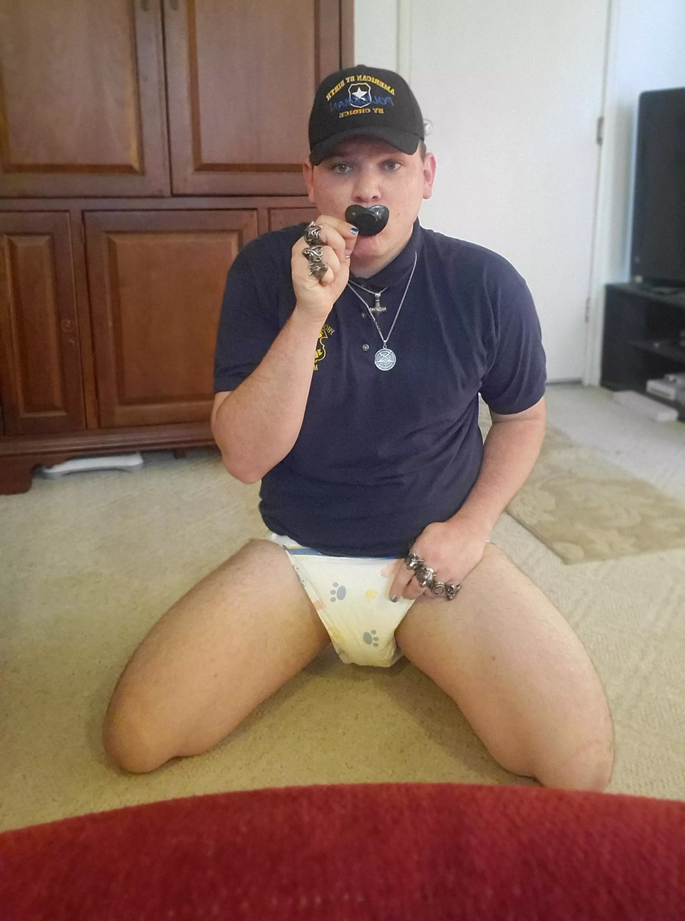 anybody else love to dress up while diapered? Here's my recent outfit, a baby cop 😚