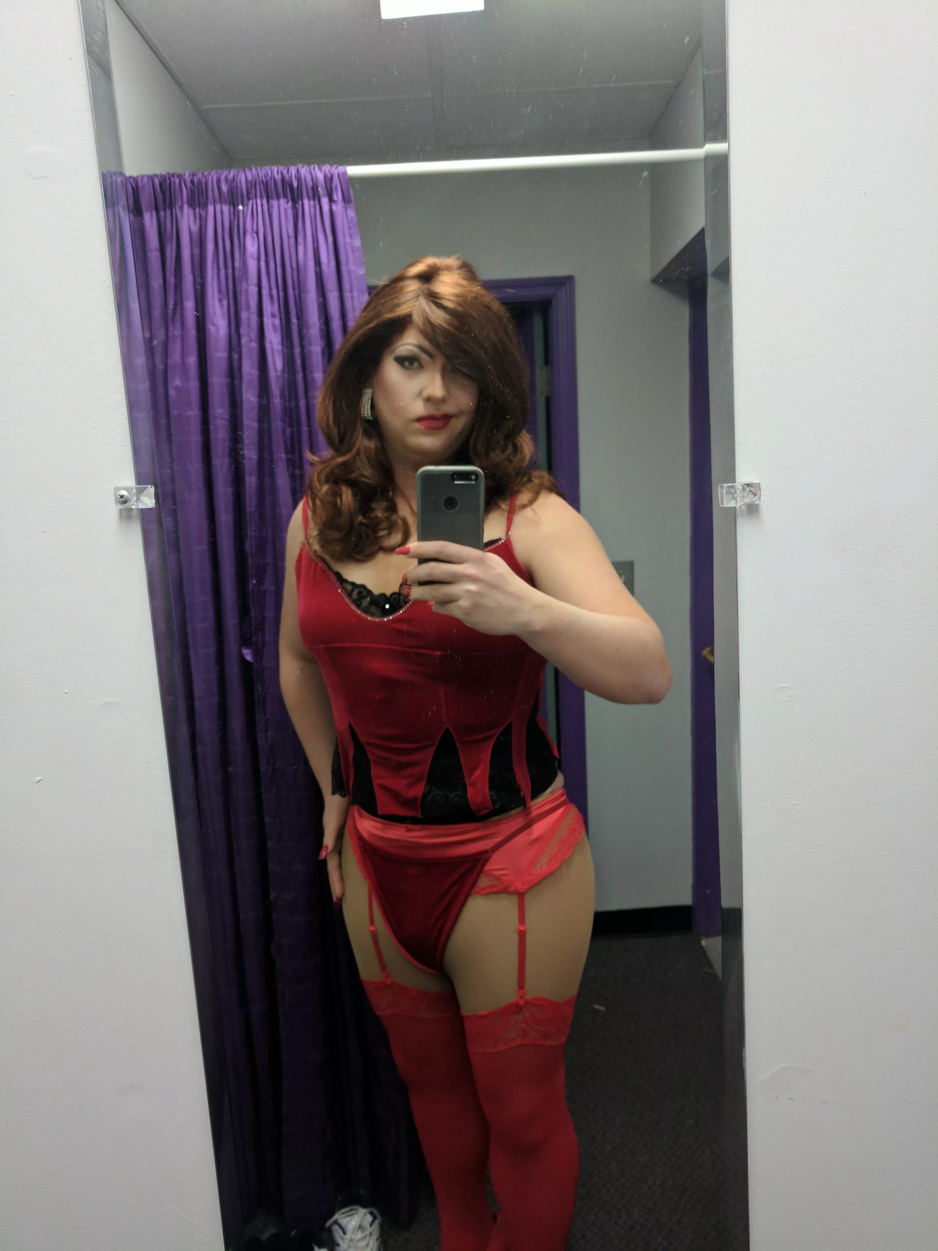 Boy clothes on the floor, the real me in the mirror.