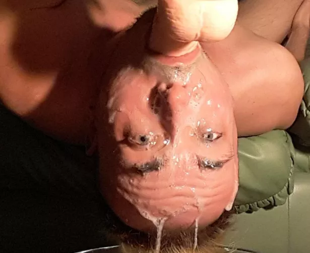 Cover in cum and the dildo plugs my throat as im made to sit here humiliated and soaked in their loads, dont i look glorious and i smell amazing in their man juices