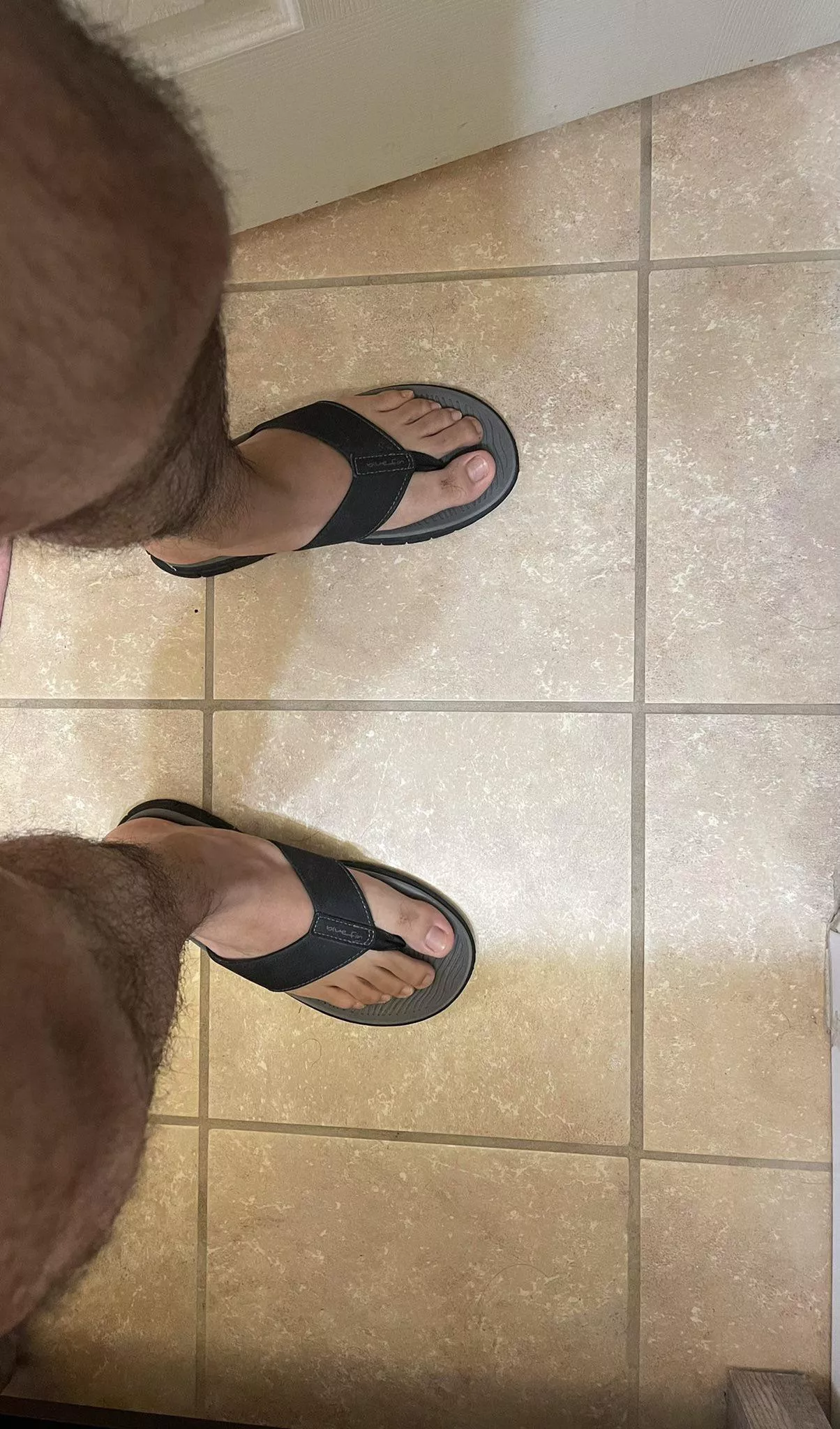 Decided to try on my father’s flip flops Decided to try on my father’s flip flops