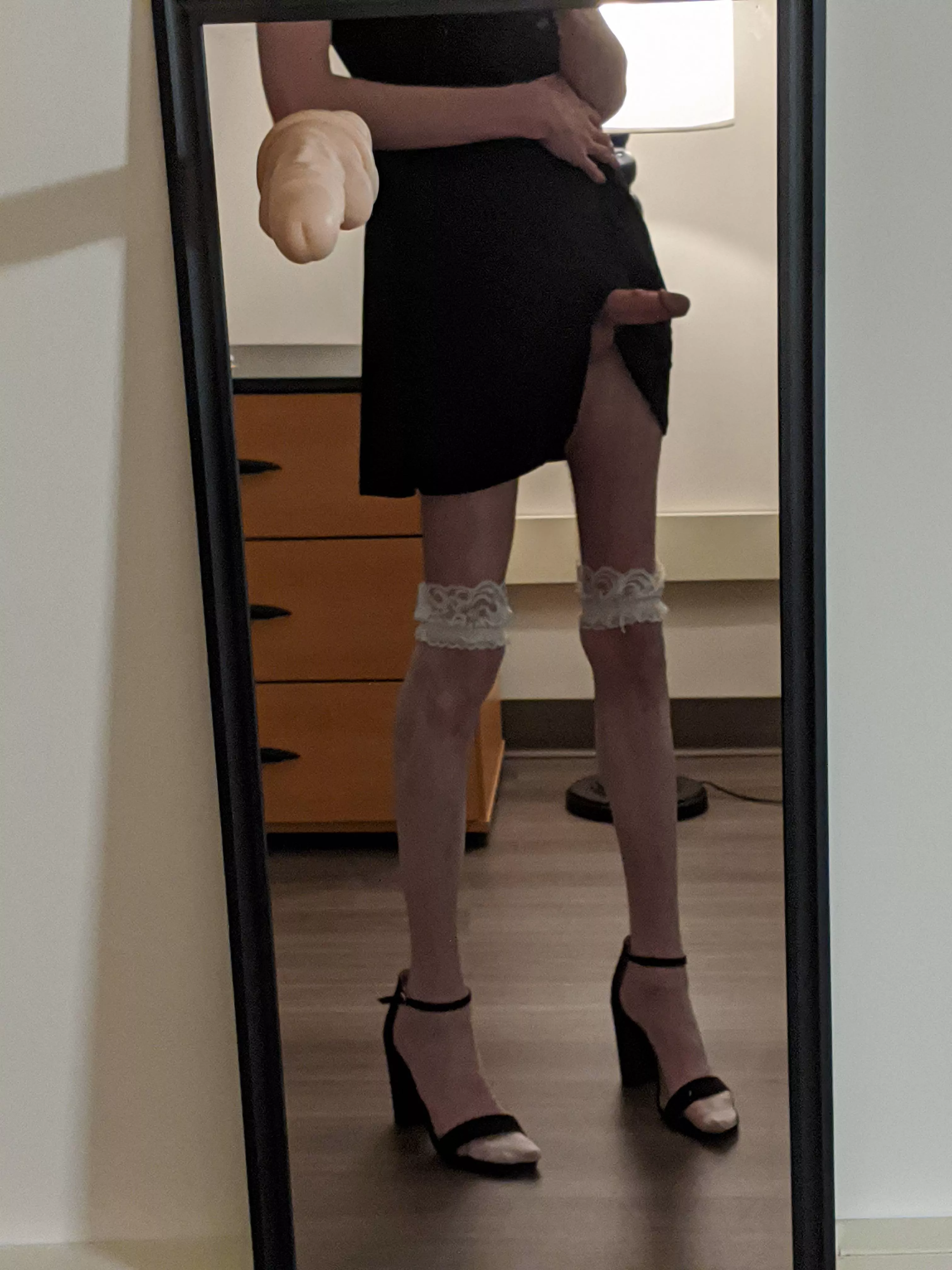 Do you like my heels and my little black dress? I feel a slight breeze...