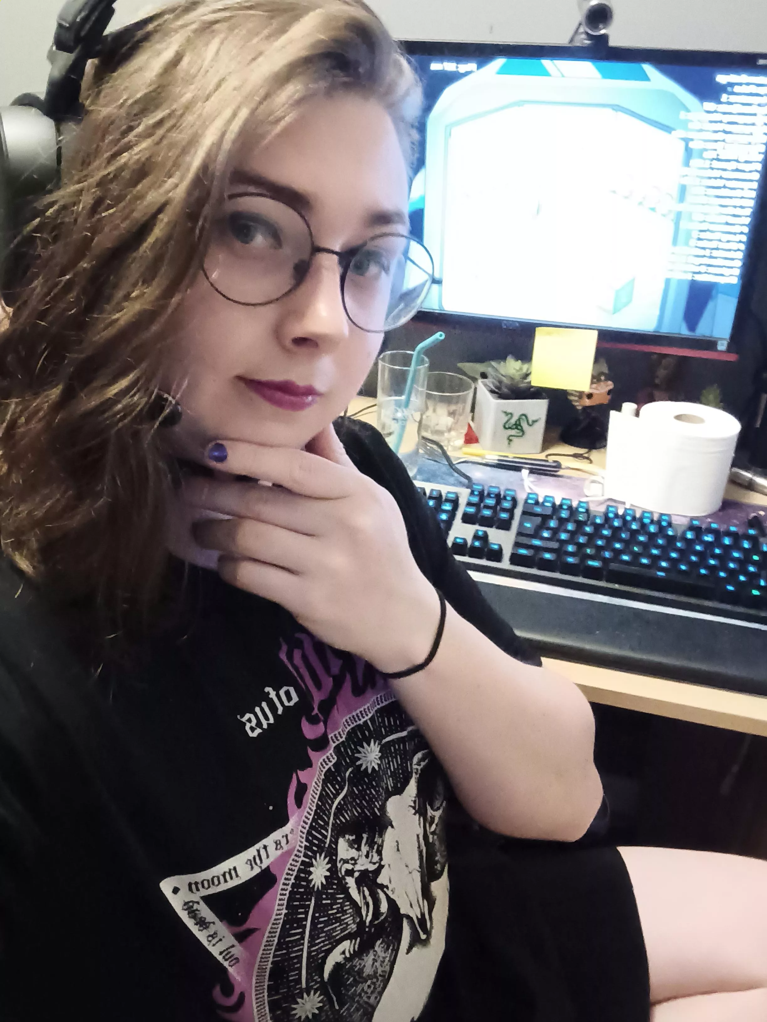 edgy e girl playing video games all dressed up in there skirt