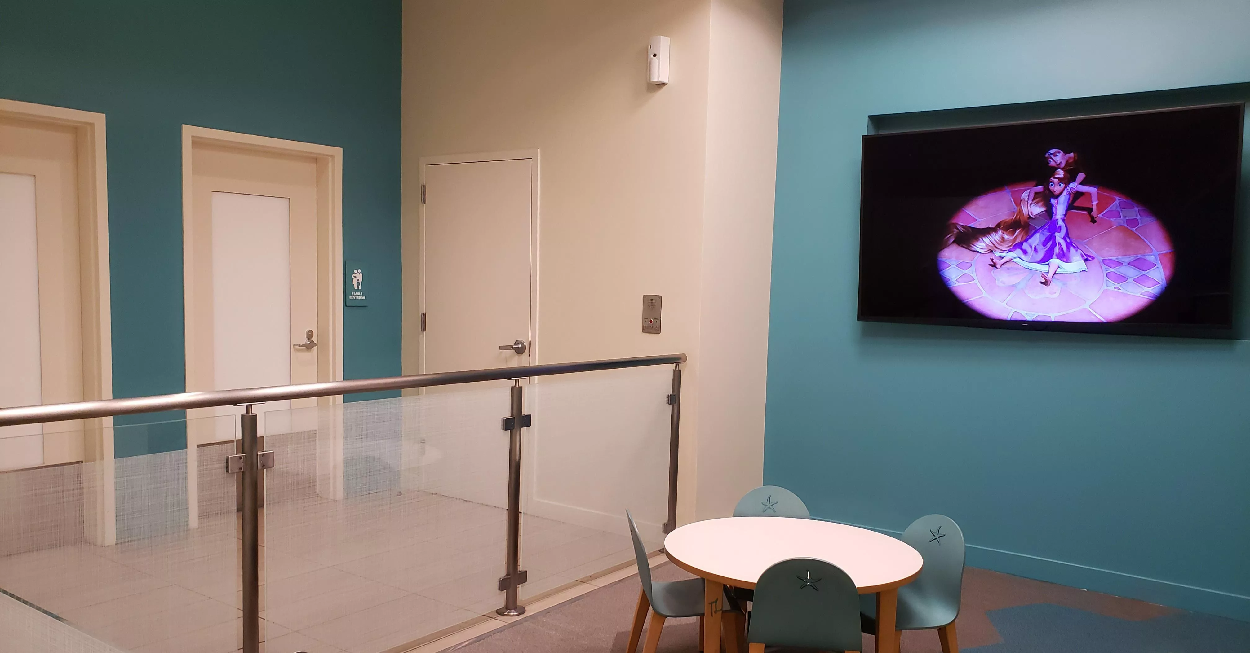 eeeeeek! totally in love with this family restroom. watching tangled before my change 🥰