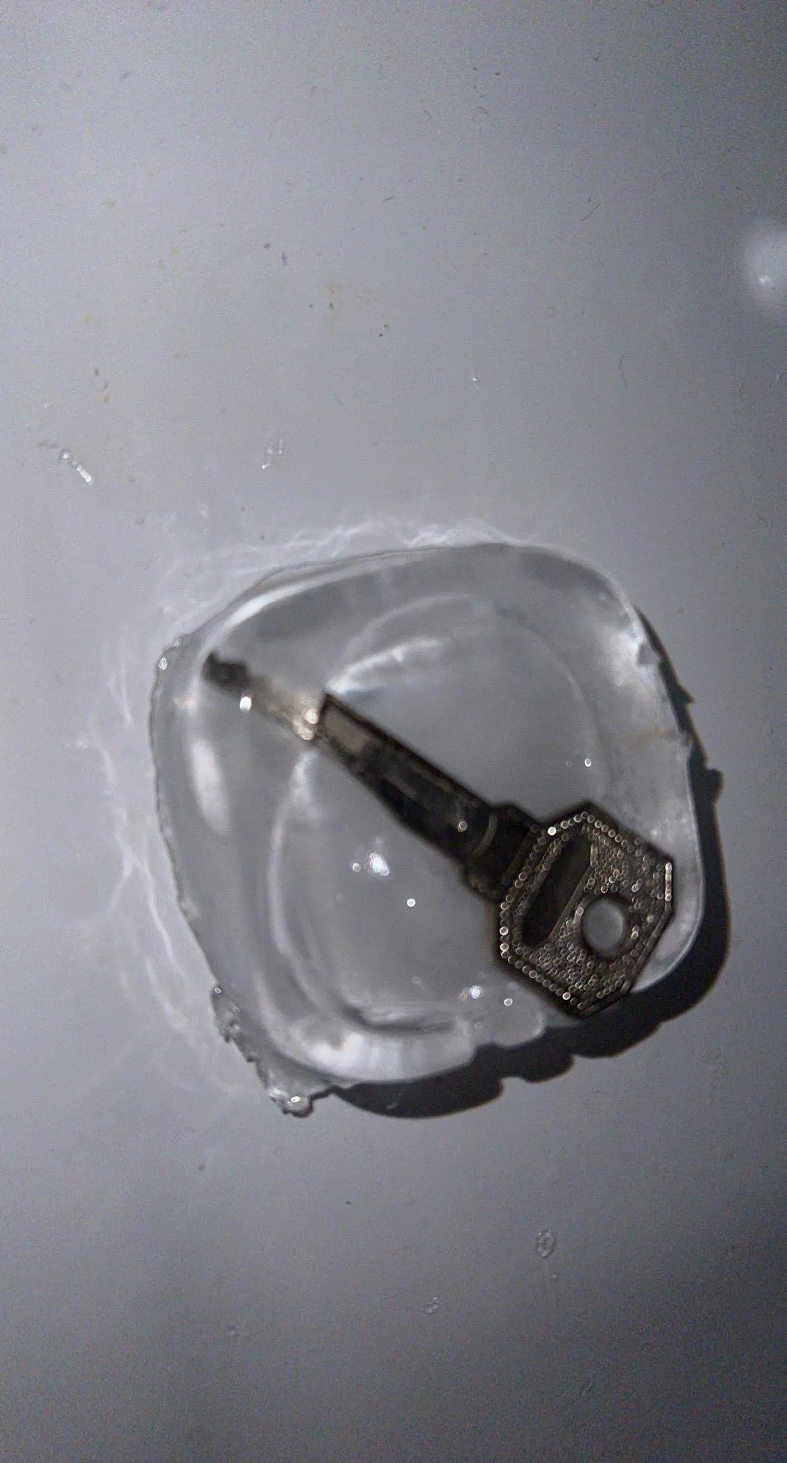 Froze his key, what else can I do with it so that we can't access it for a short while at home!???