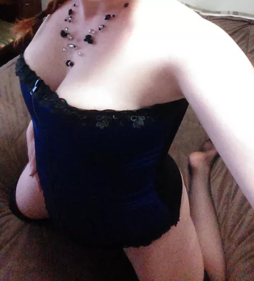 Happy (F) riday everyone! She looks good in a corset doesn't she?
