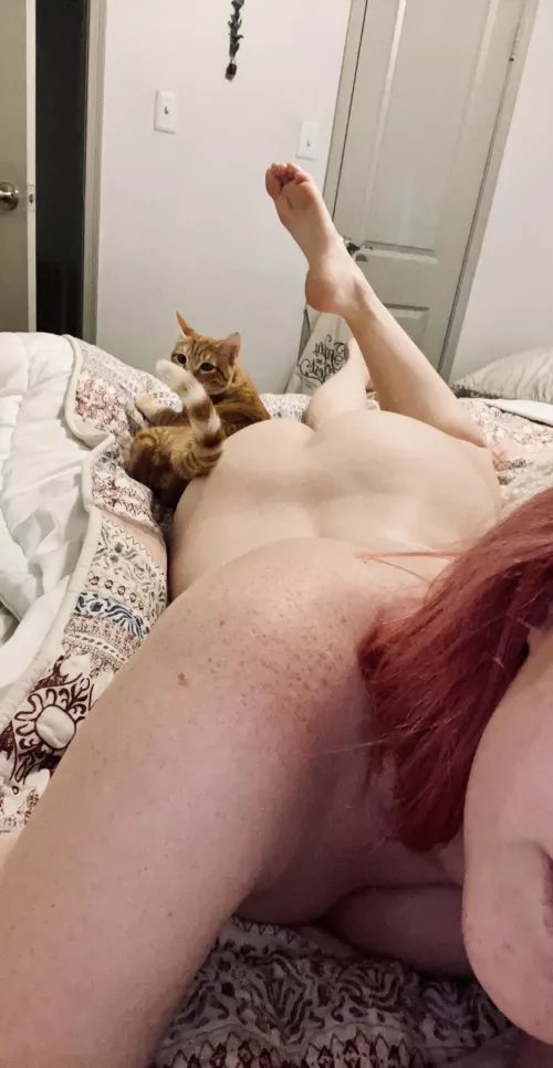 His favorite place to snuggle 😂 Always self conscious about my shoulder freckles tbh.