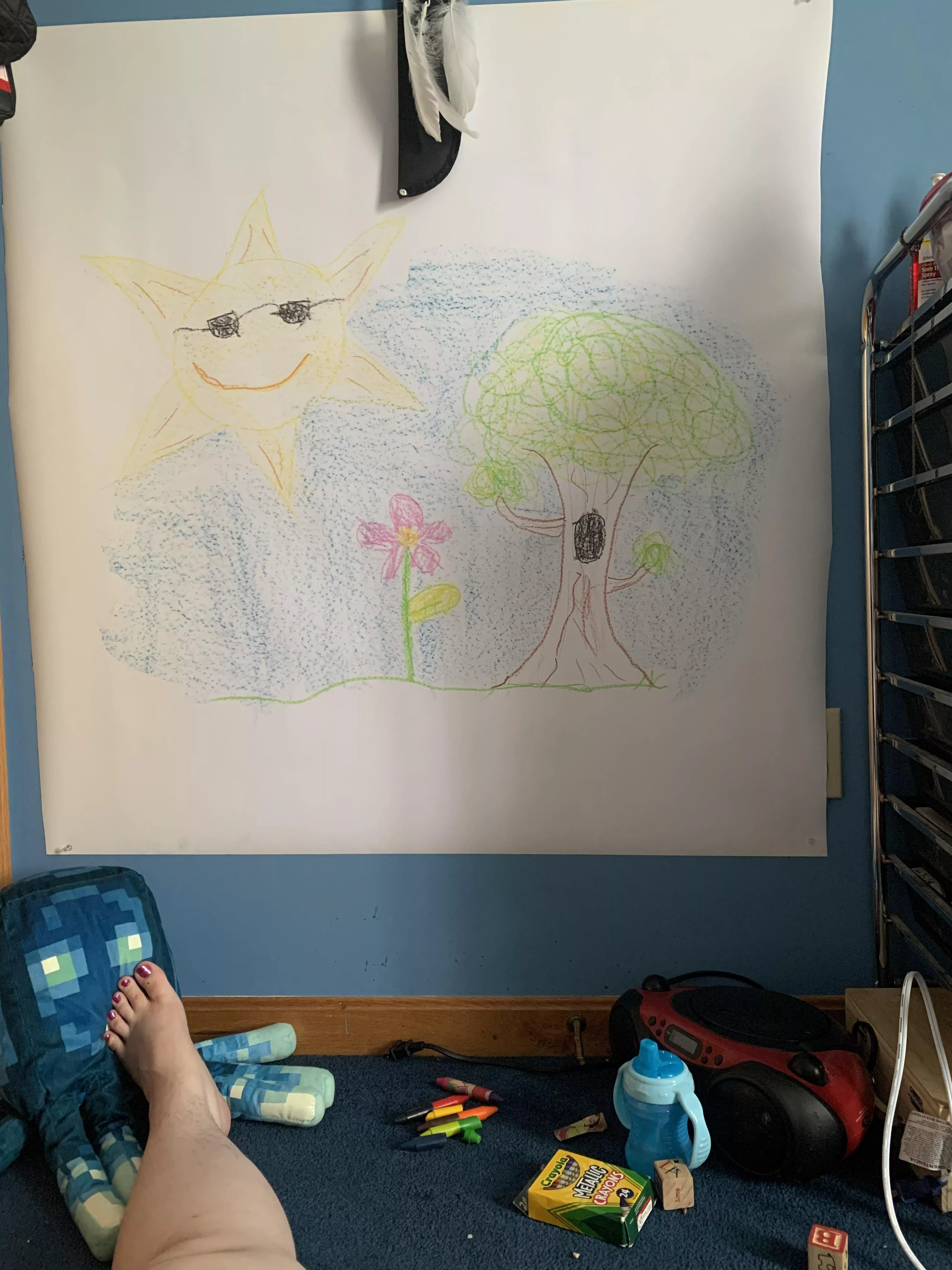 I got a big roll of paper and put it in my wall! Look at my pretty picture! :D