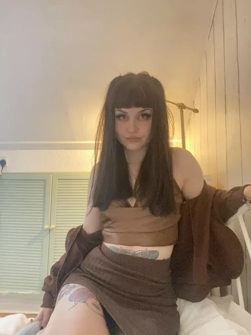 I like the way my stomach tattoo peeks out from my crop top