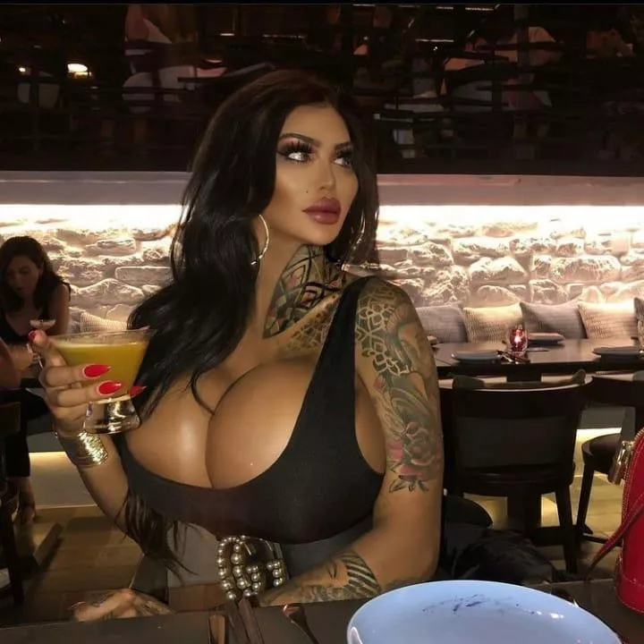 Knowing everyone in the bar wants to look at her