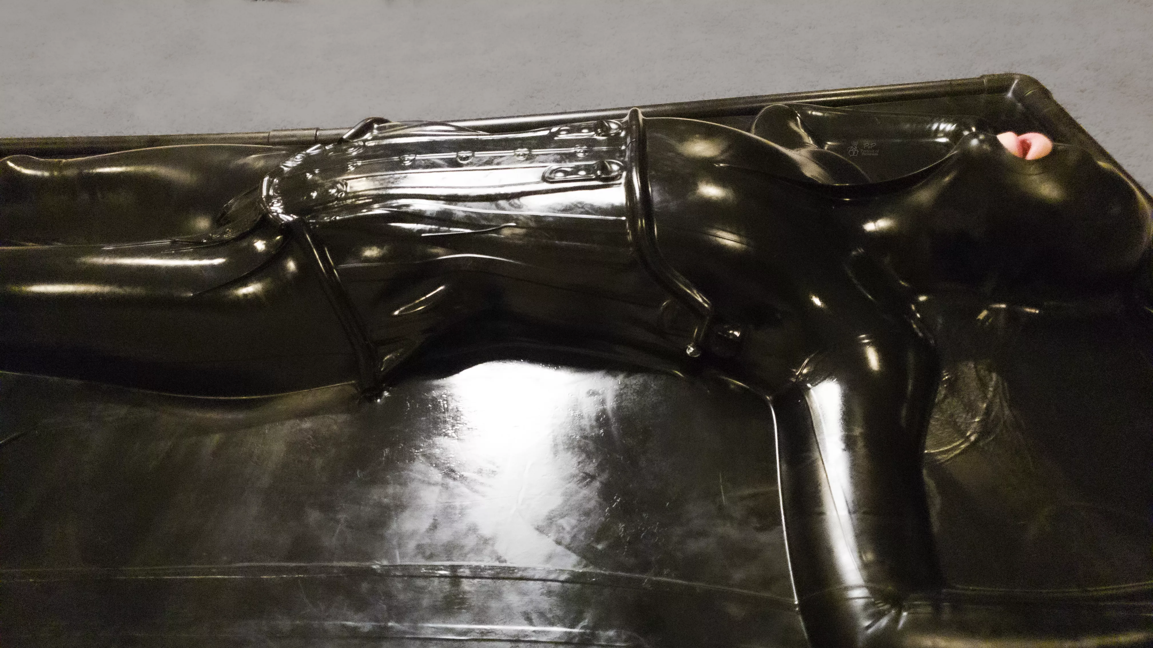 Layers of Latex: I am sealed inside a Latex Vacbed while wearing a Latex Catsuit, and a Latex Corset.