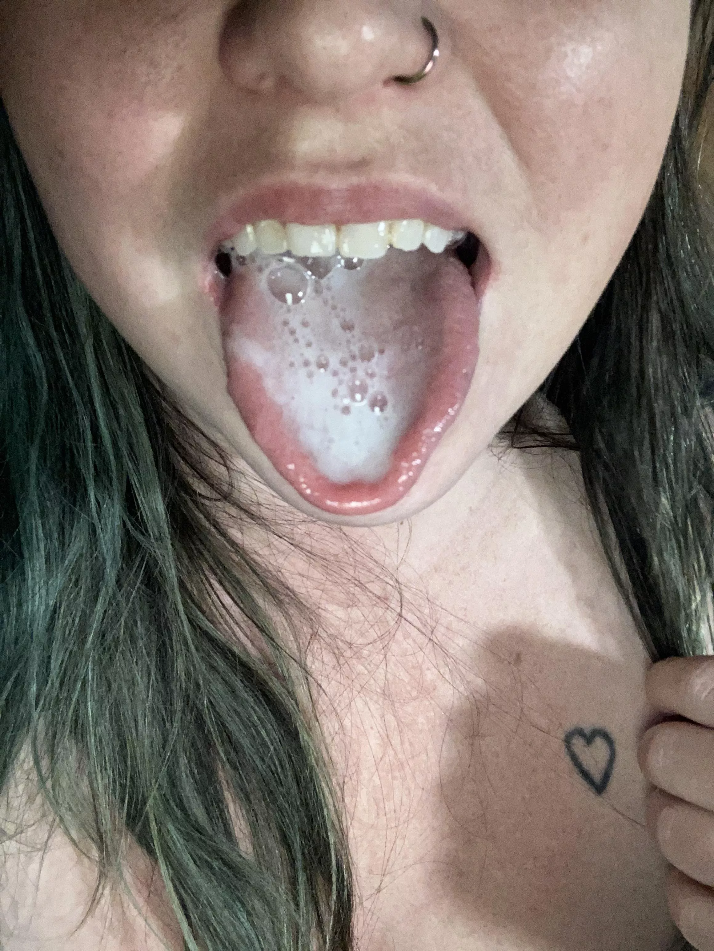 Long tongue covered in cum