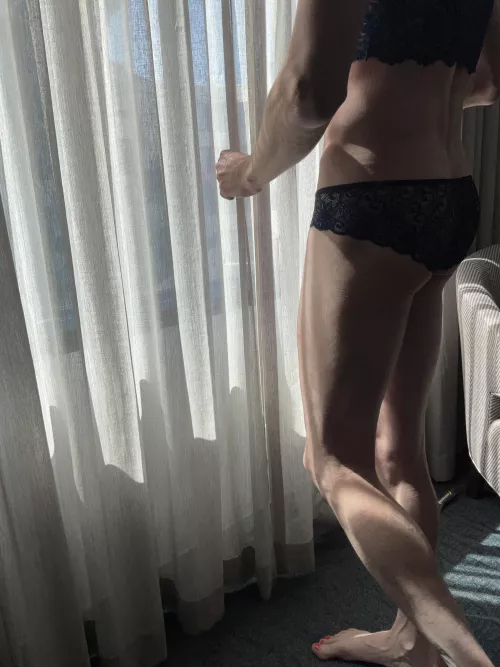 Matching blue bra and panties in the afternoon sun