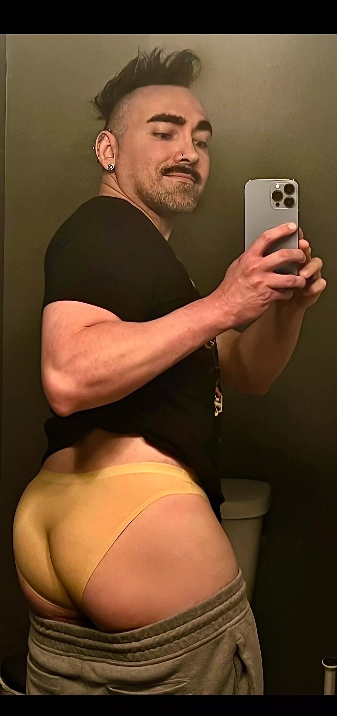 Me wearing my dad’s used briefs. I love to wear em right when he takes em off to go shower. So it’s still warm & sweaty of him