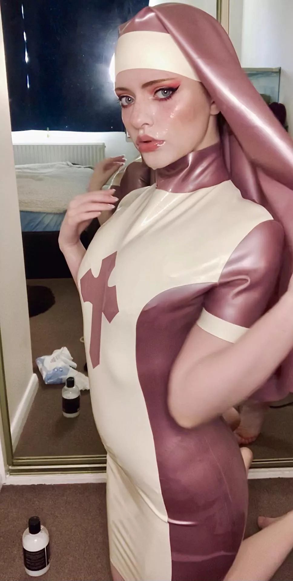My new latex nun dress from westwardbound, I might be covered in cum lube too…. Just adds to the shine! 🤣😳❤️