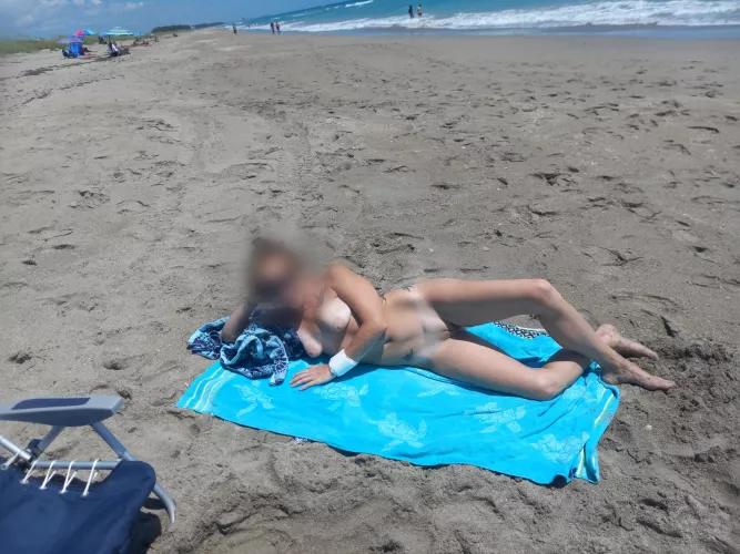 my wife naked on the beach