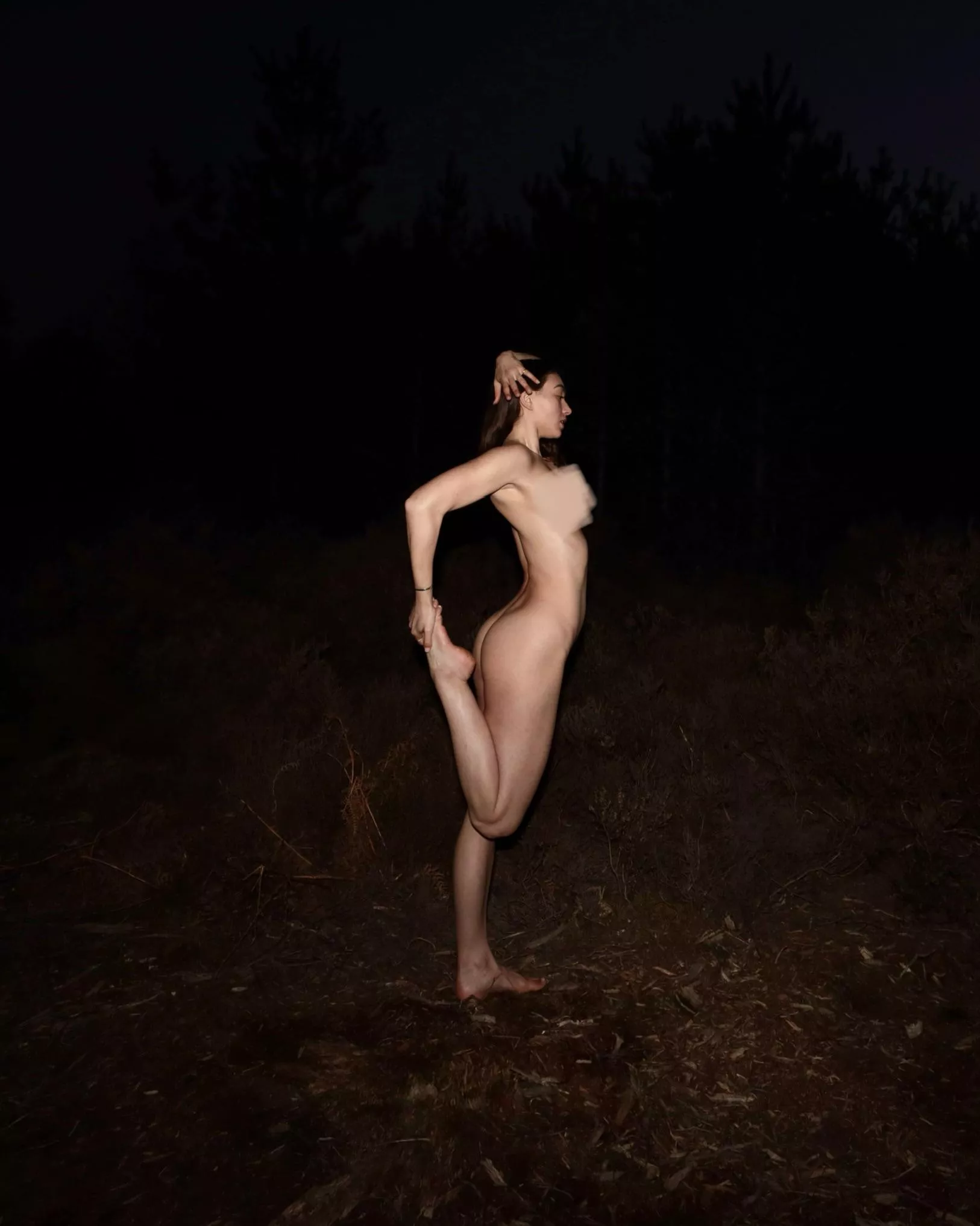 Naked yoga in the woods
