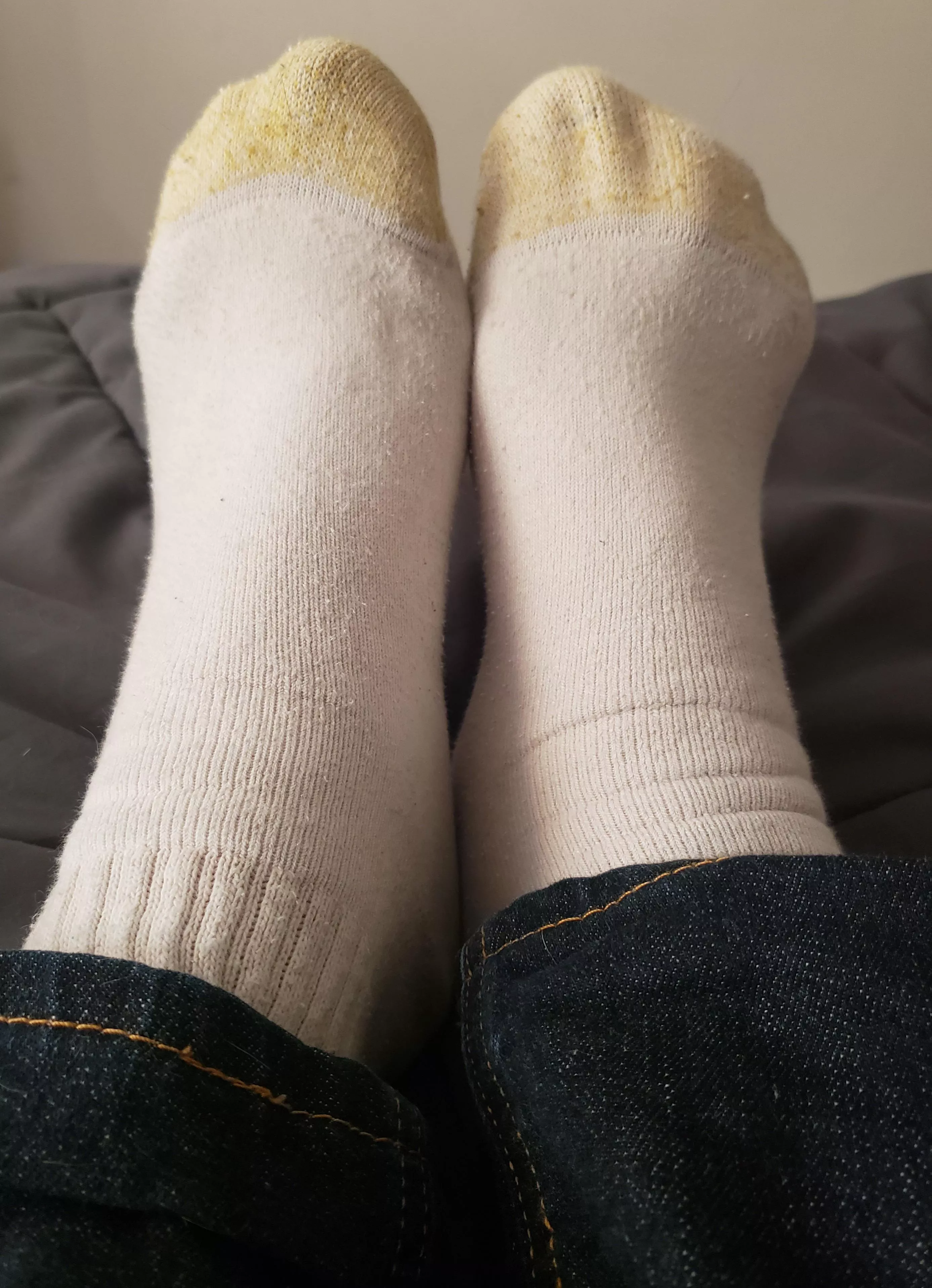new here, size 12 feet. should i take my socks off?