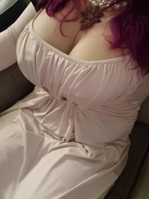 playing video games in cosplay with no bra