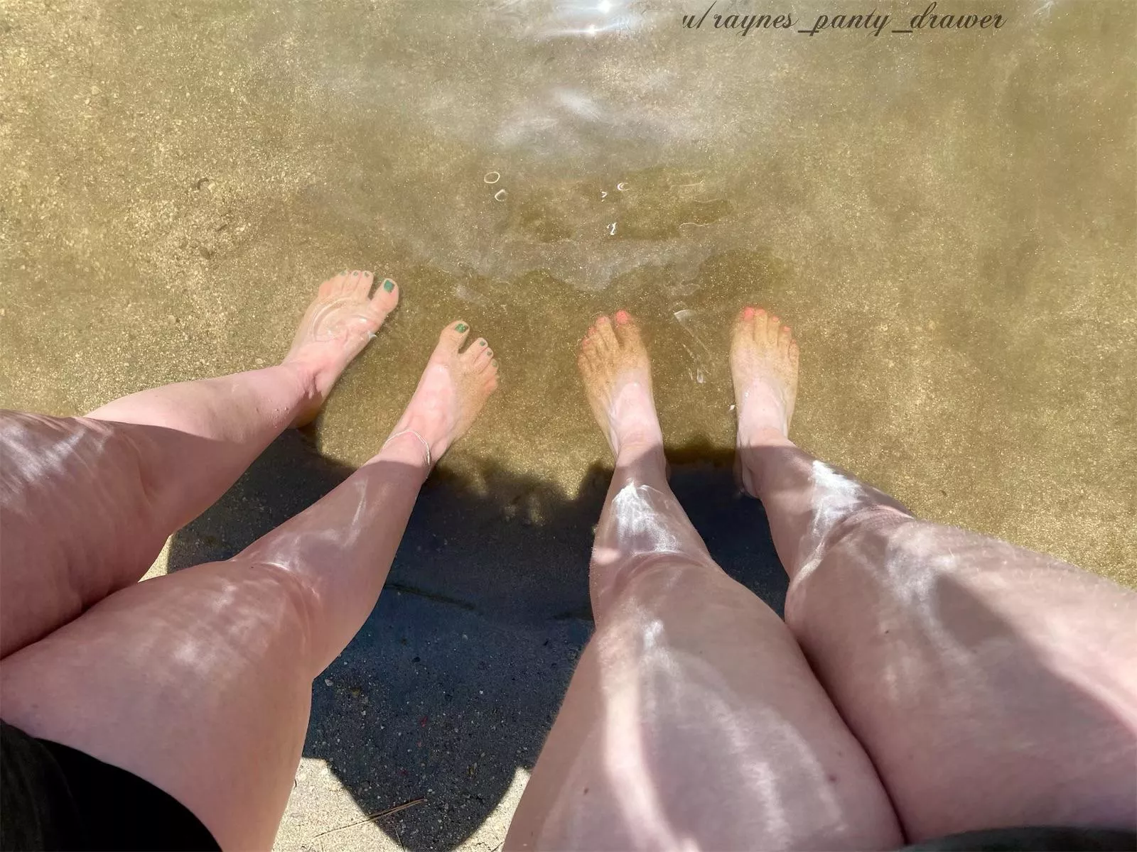 POV you look down to see our feet in the water POV you look down to see our feet in the water