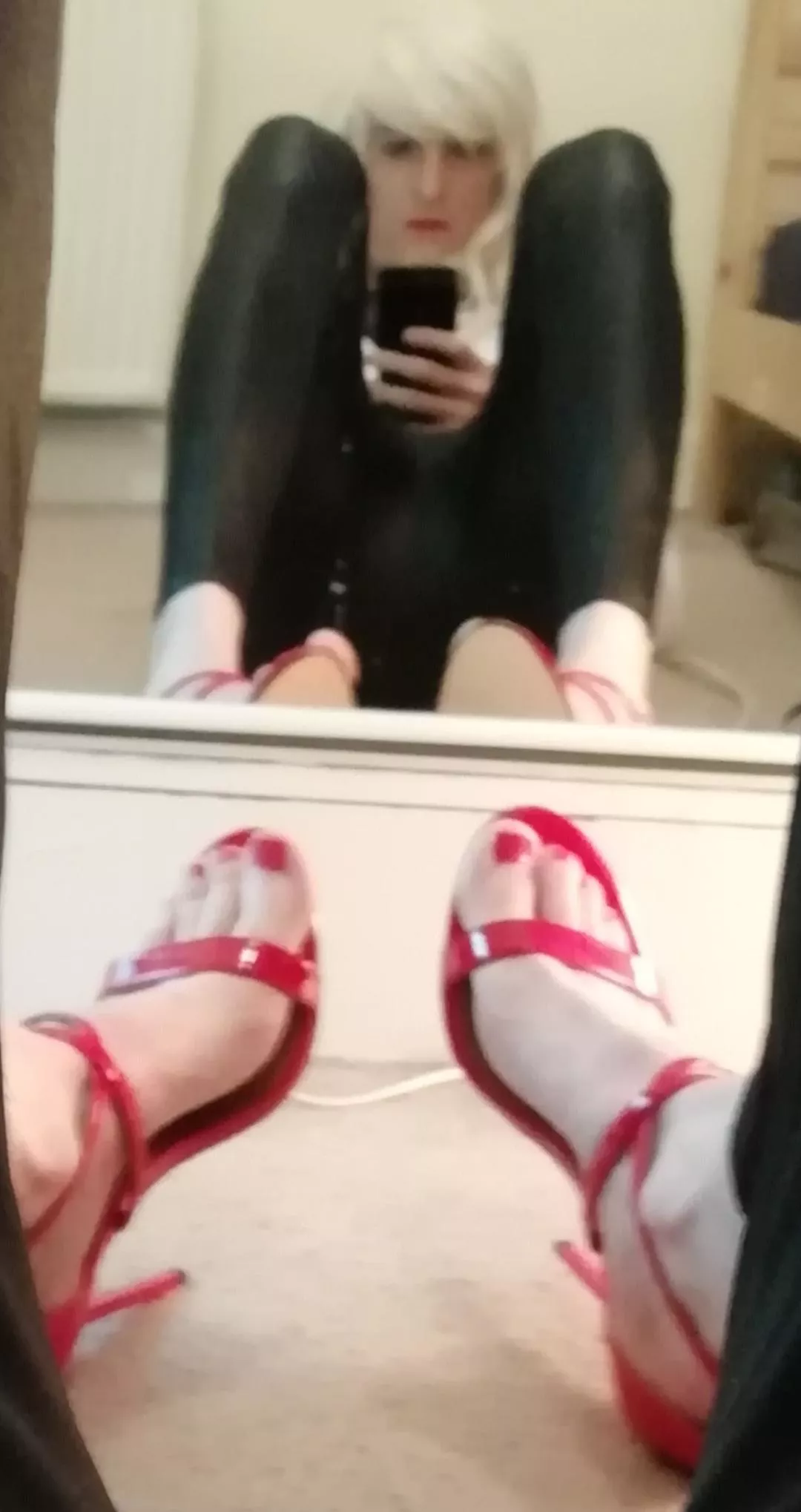 Sorry it's a bit blurry. Love these red heels.